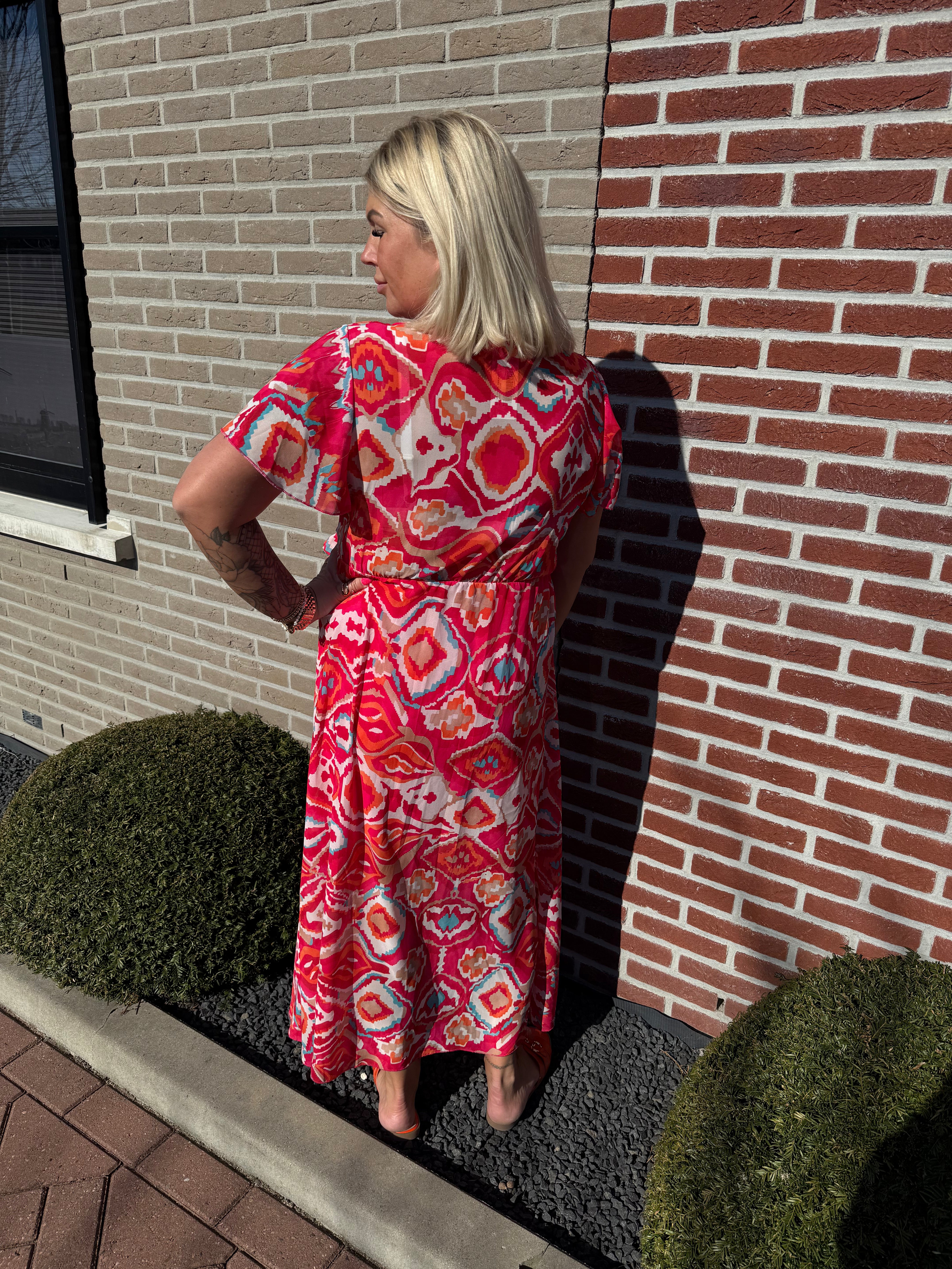 Maxi jurk met strik print wave patroon roze/rood