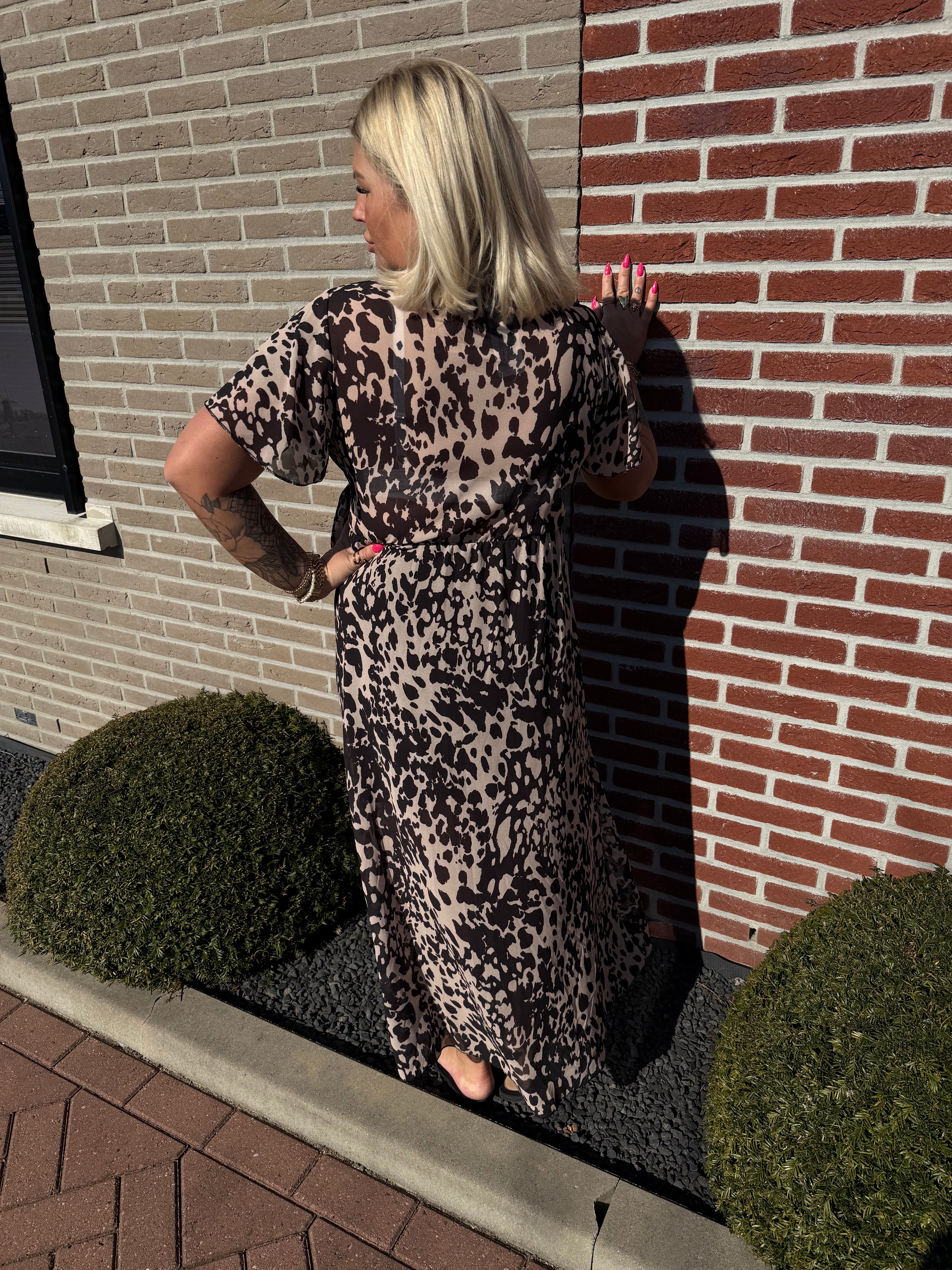 Maxi jurk met strik print gevlekt zwart/beige