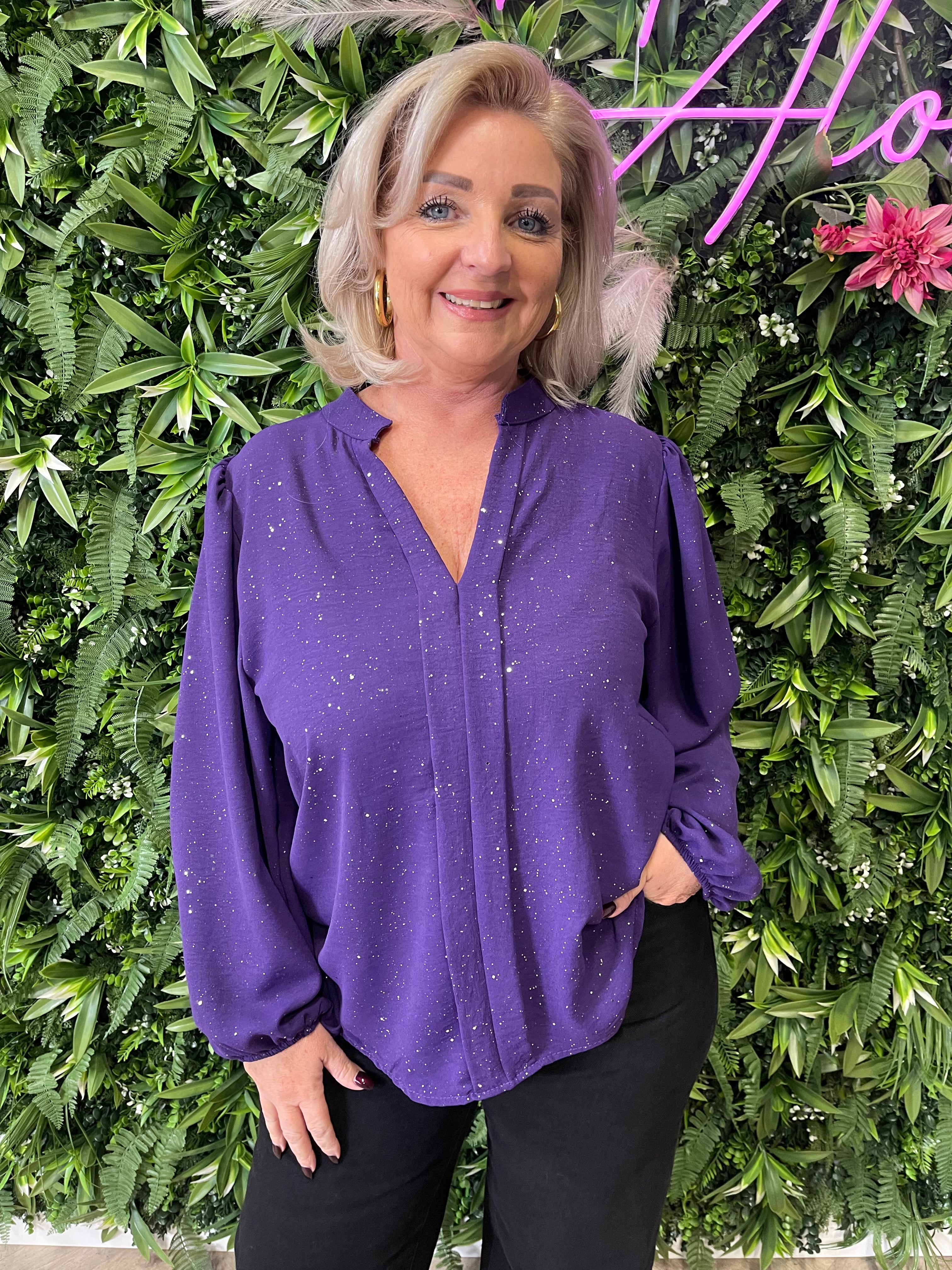 Blouse roezel met pofmouwen glitter paars