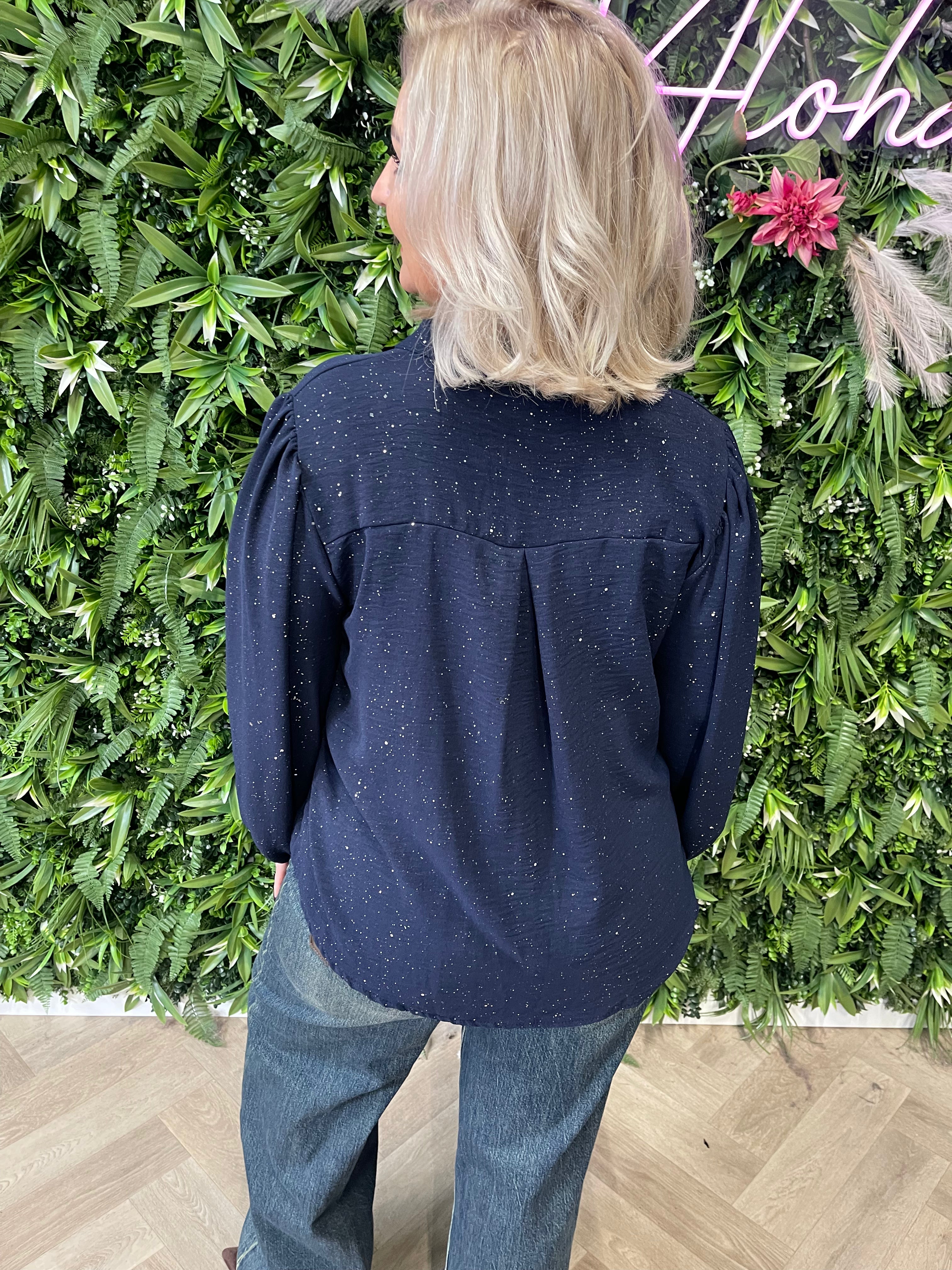 Blouse roezel met pofmouwen glitter marineblauw