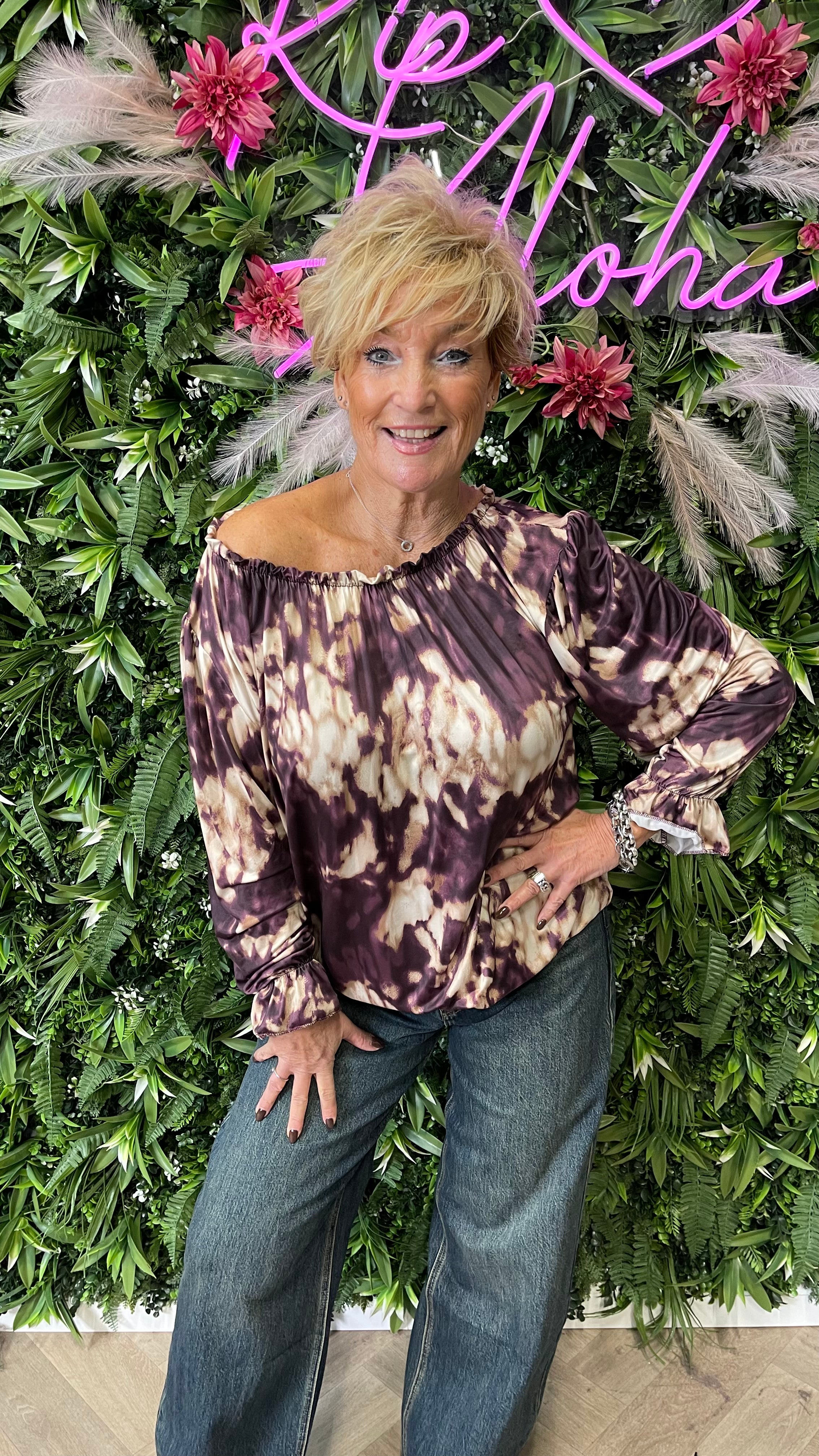 Blouse met abstracte print en roezelhals paars