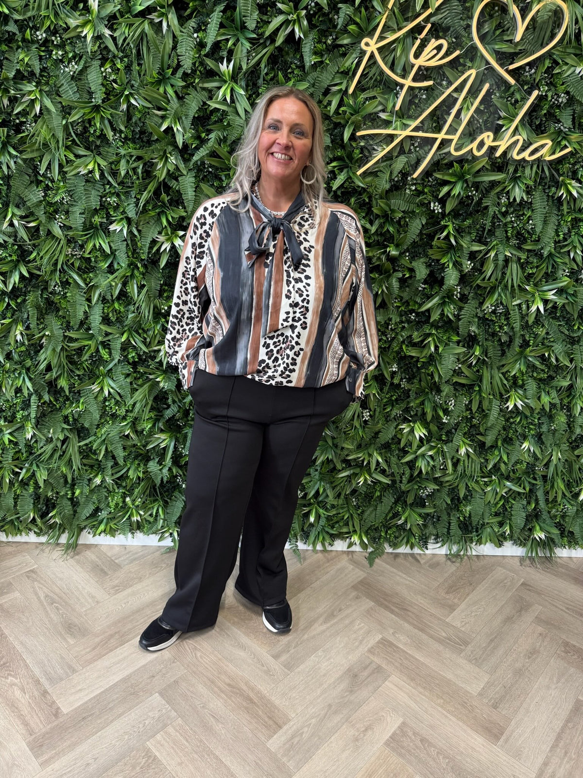 Blouse strik met strepen en panterprint zwart