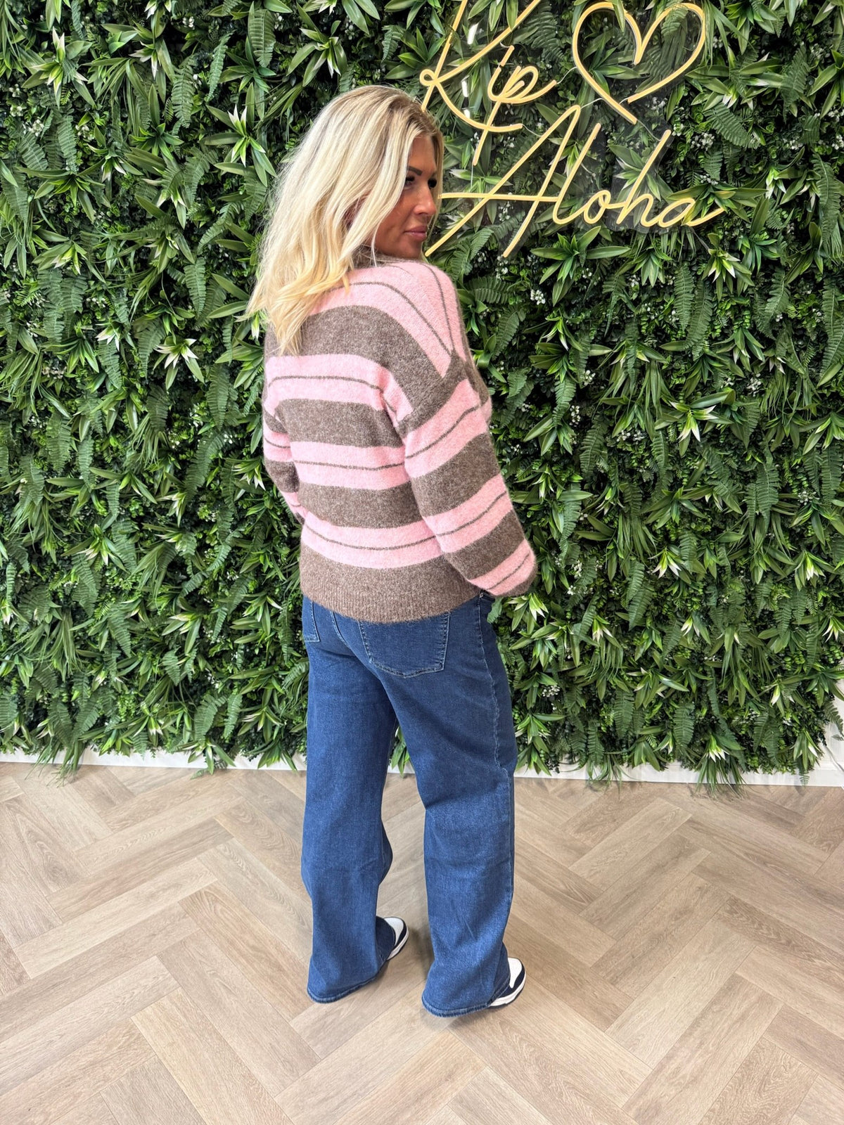 Gebreide polo trui met strepen lichtroze