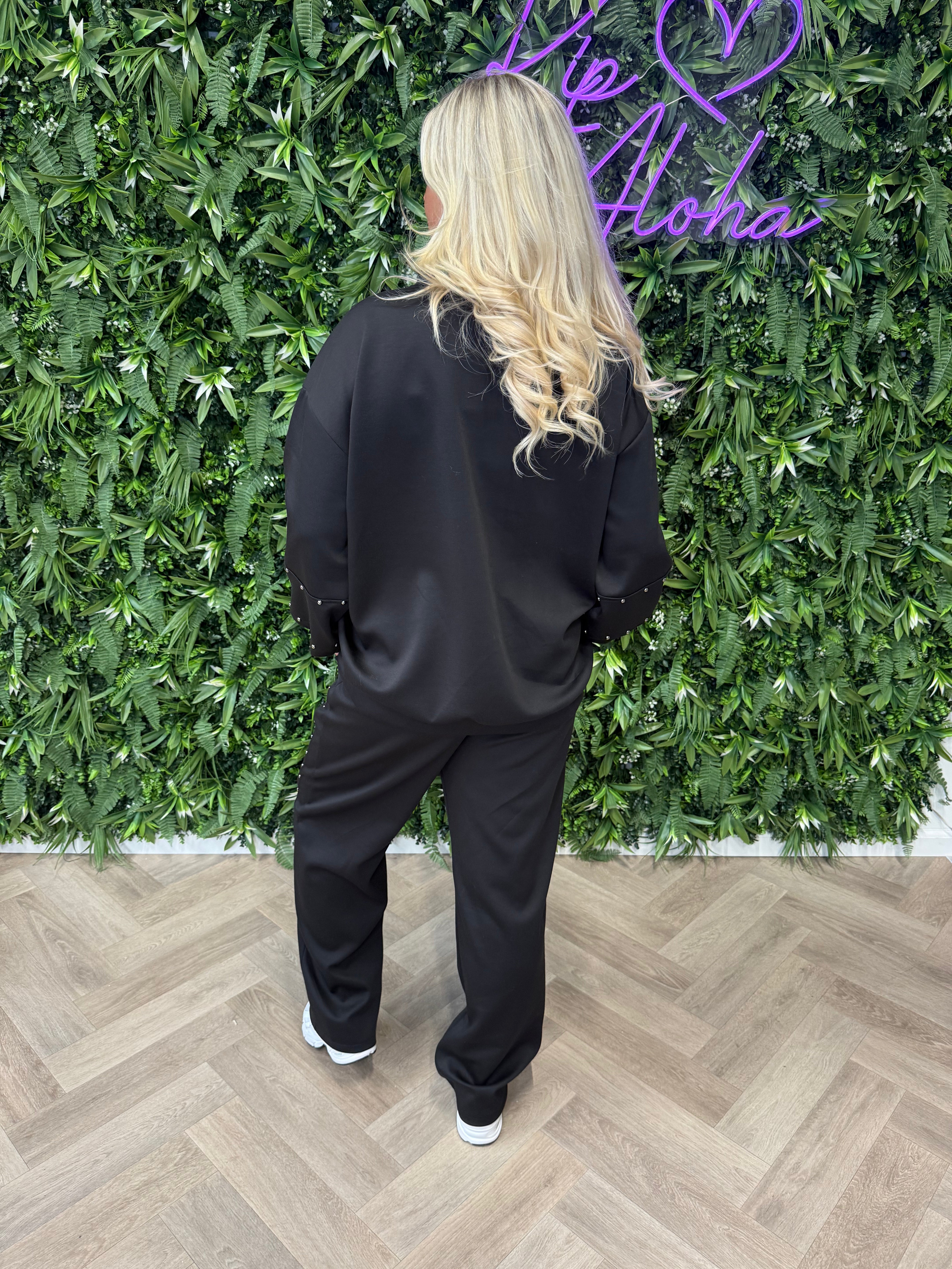 Tweedelig pak sweater pofmouwen studs zwart