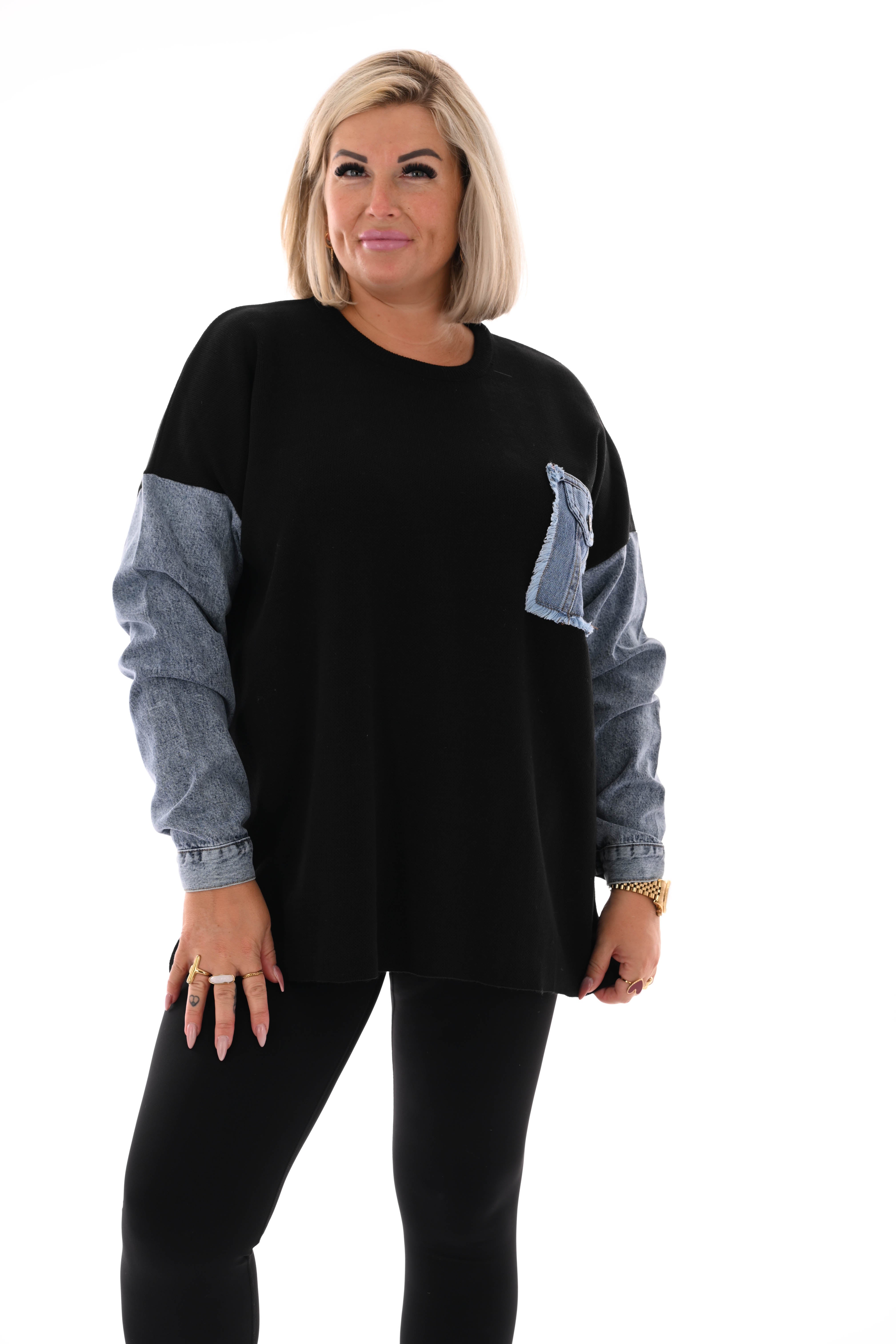 Gebreide trui met jeans zwart