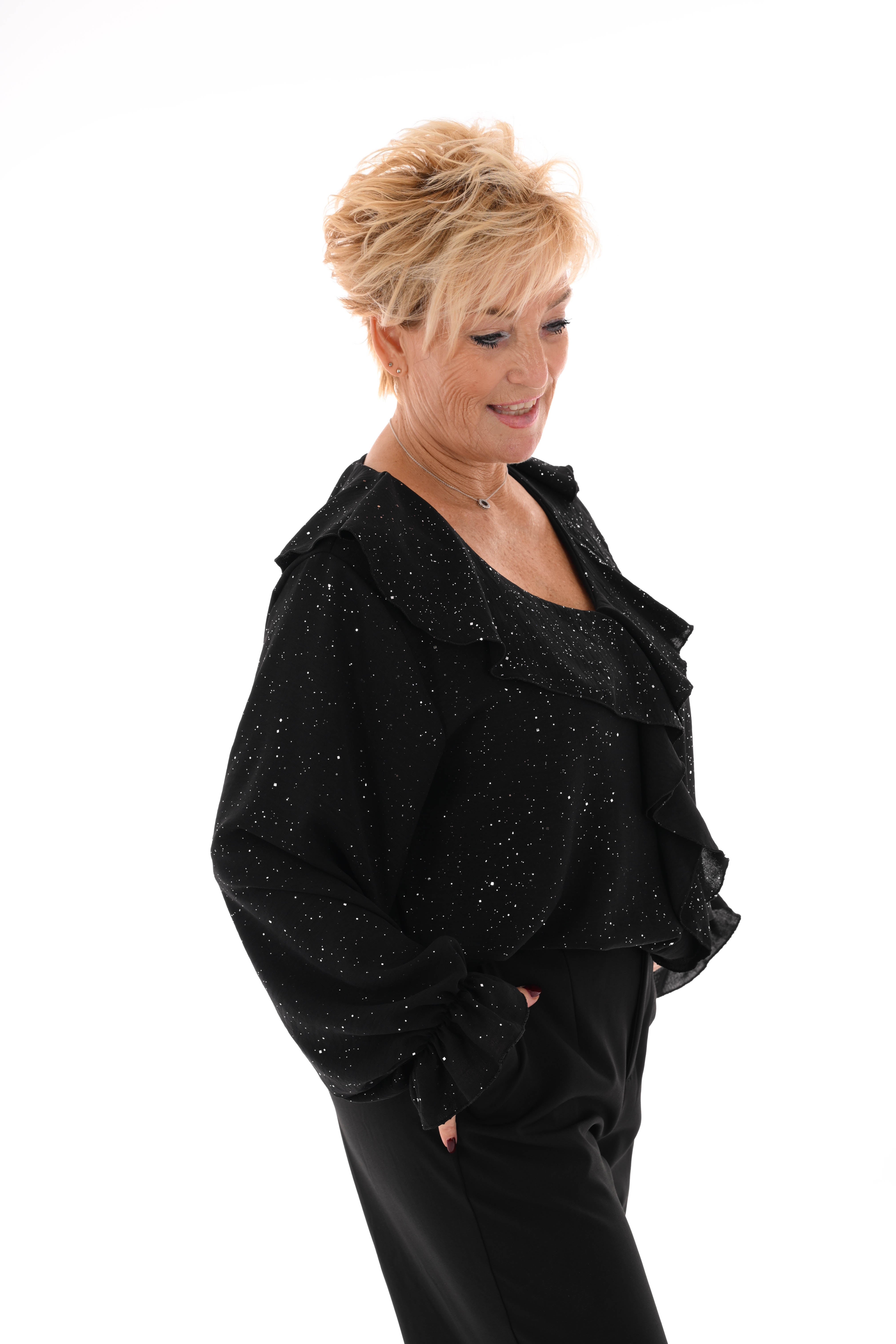 Blouse v-hals roezels glitter zwart