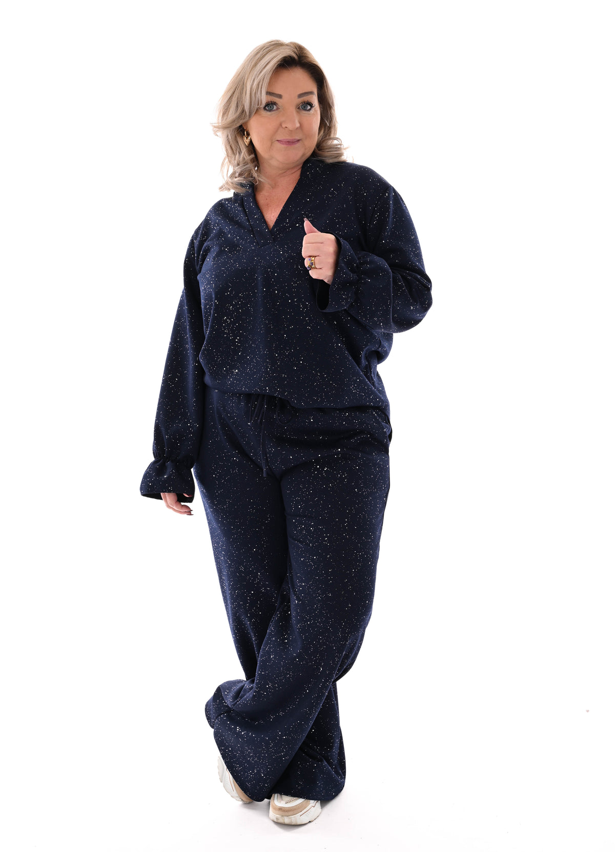Tweedelig pak glitter flakes roezelmouwen marineblauw