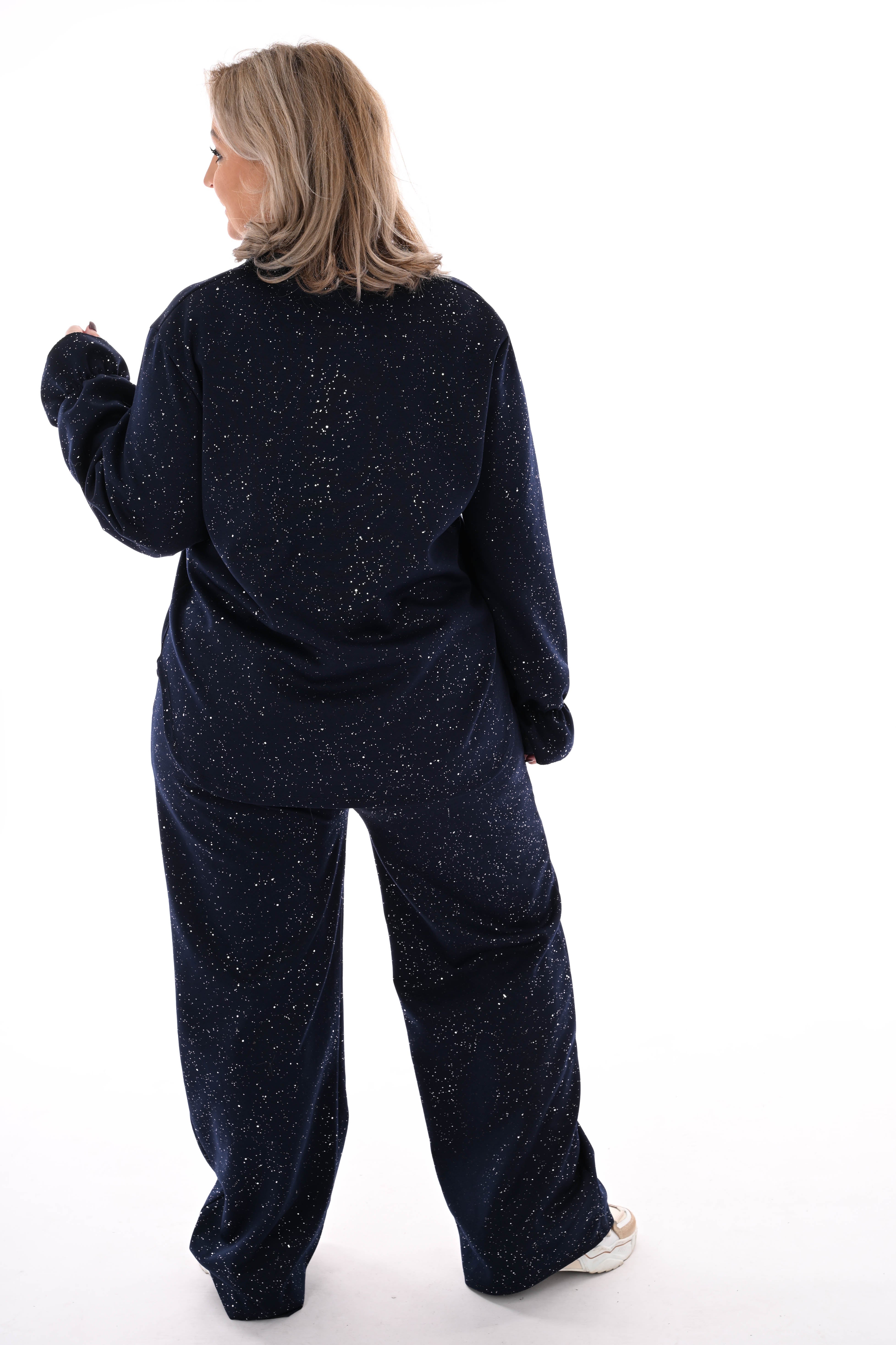 Tweedelig pak glitter flakes roezelmouwen marineblauw