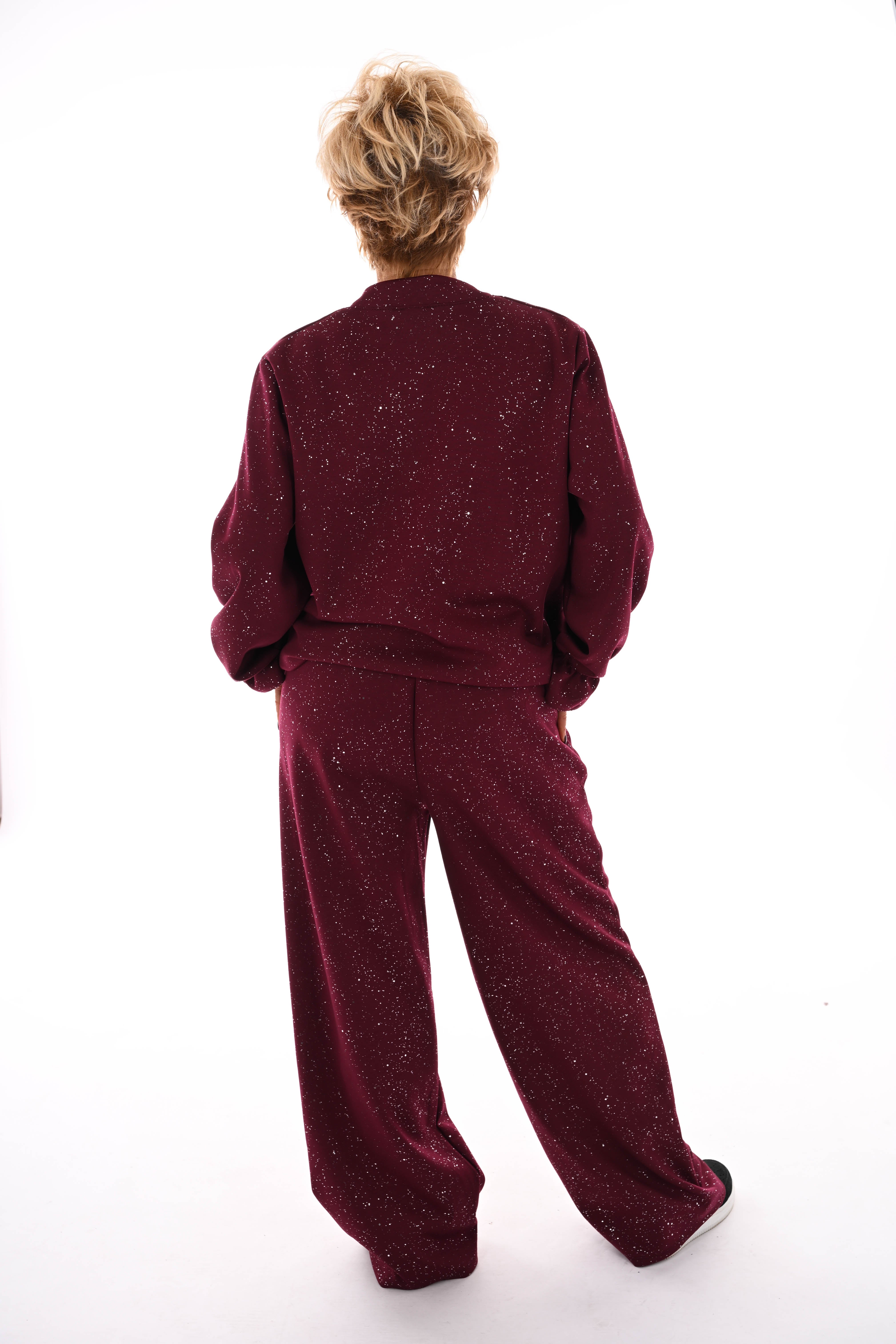 Tweedelig pak glitter flakes roezelmouwen bordeaux