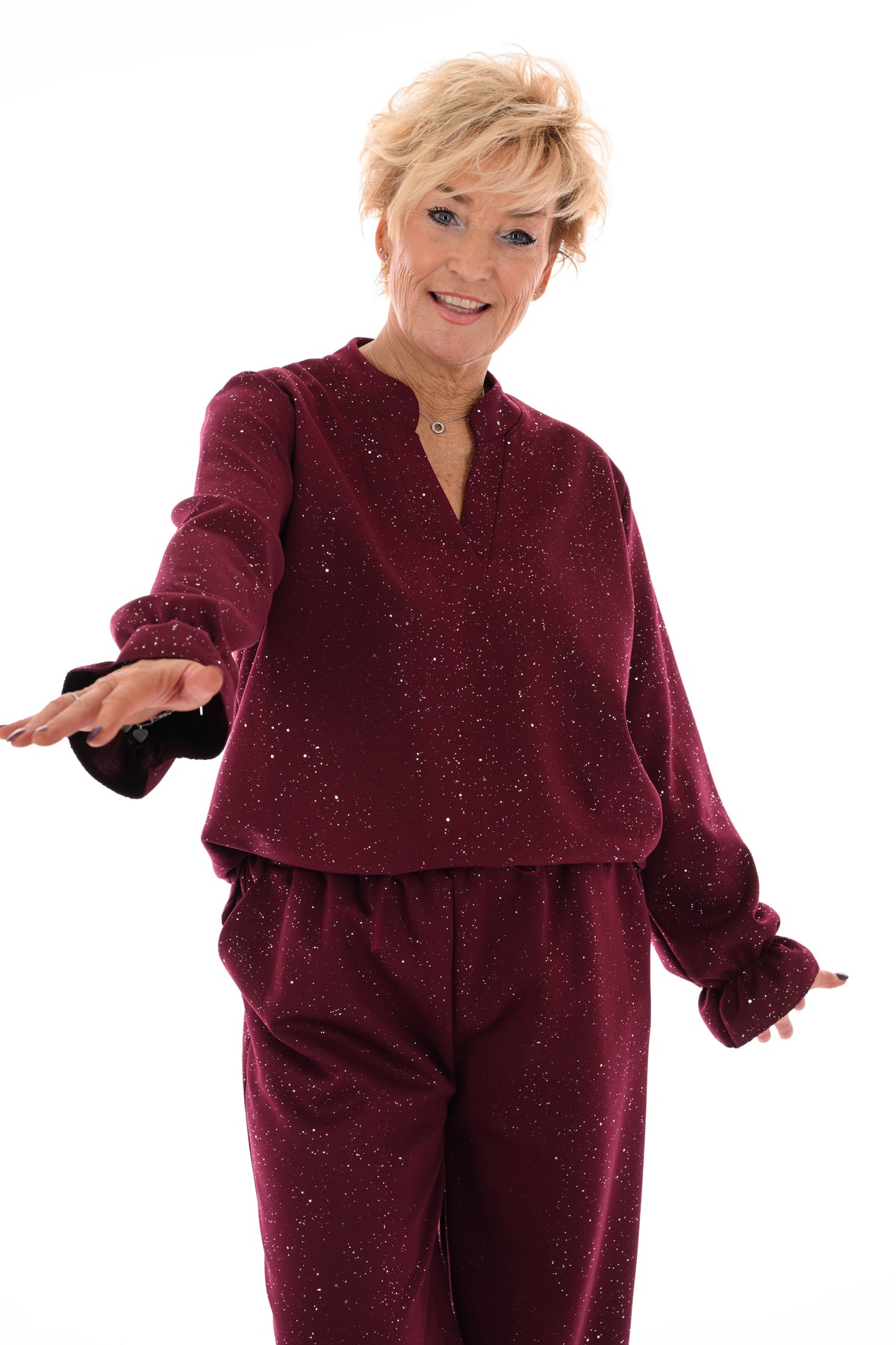 Tweedelig pak glitter flakes roezelmouwen bordeaux