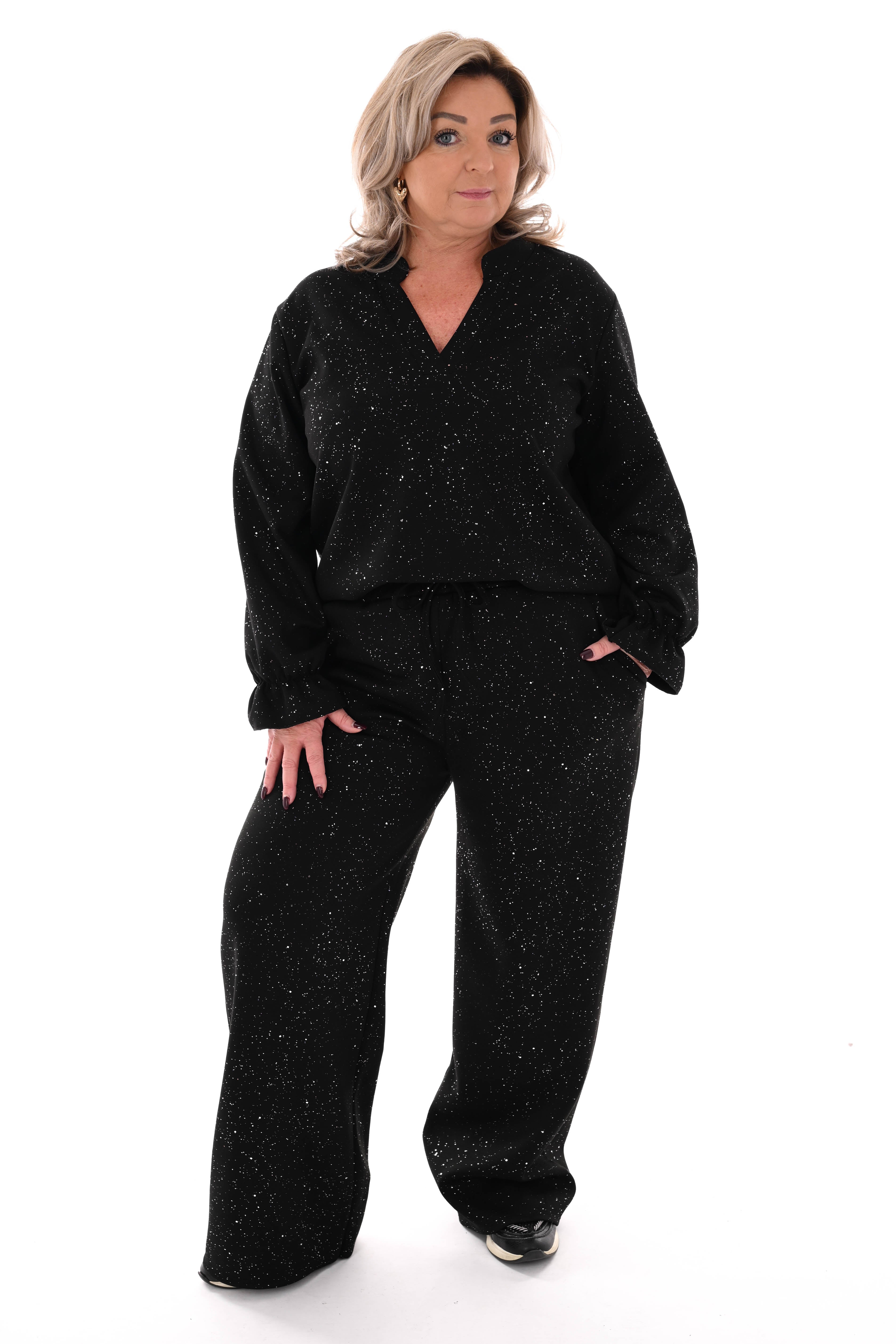 Tweedelig pak glitter flakes roezelmouwen zwart