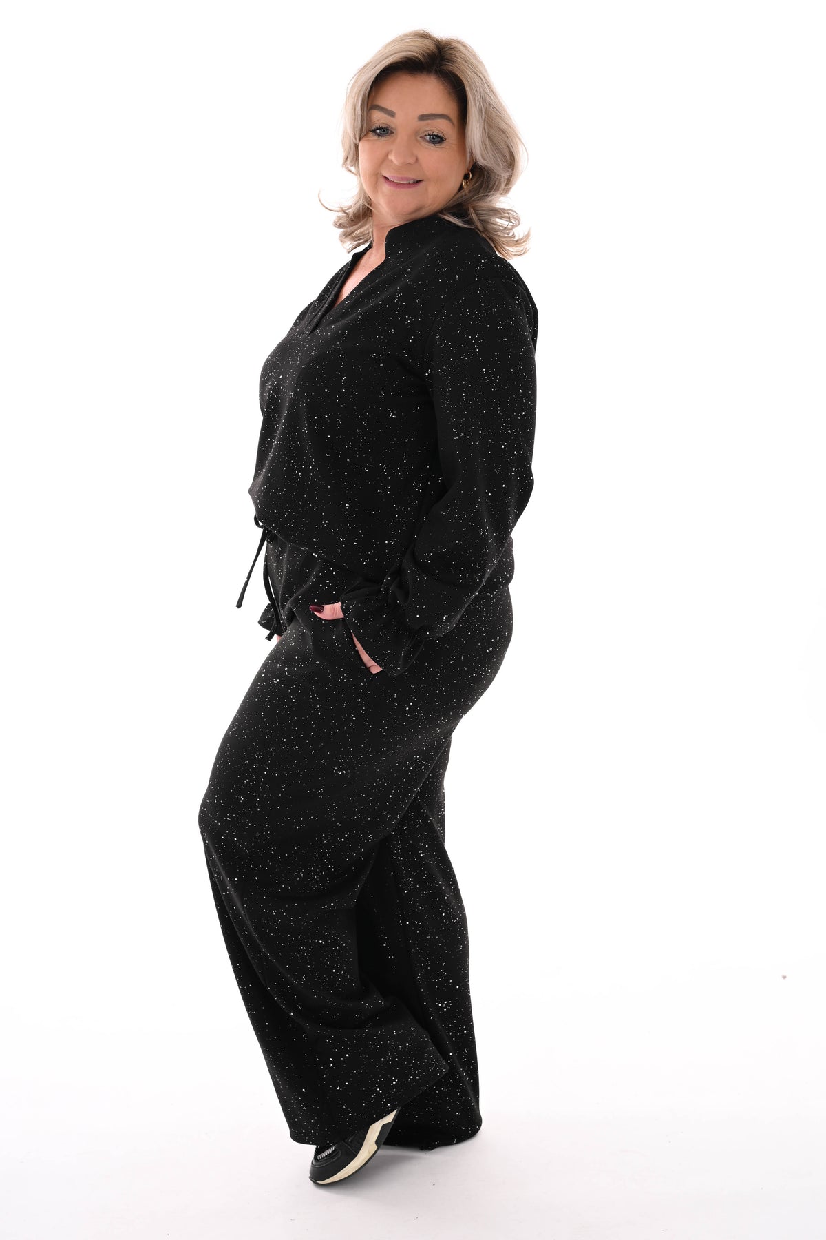 Tweedelig pak glitter flakes roezelmouwen zwart