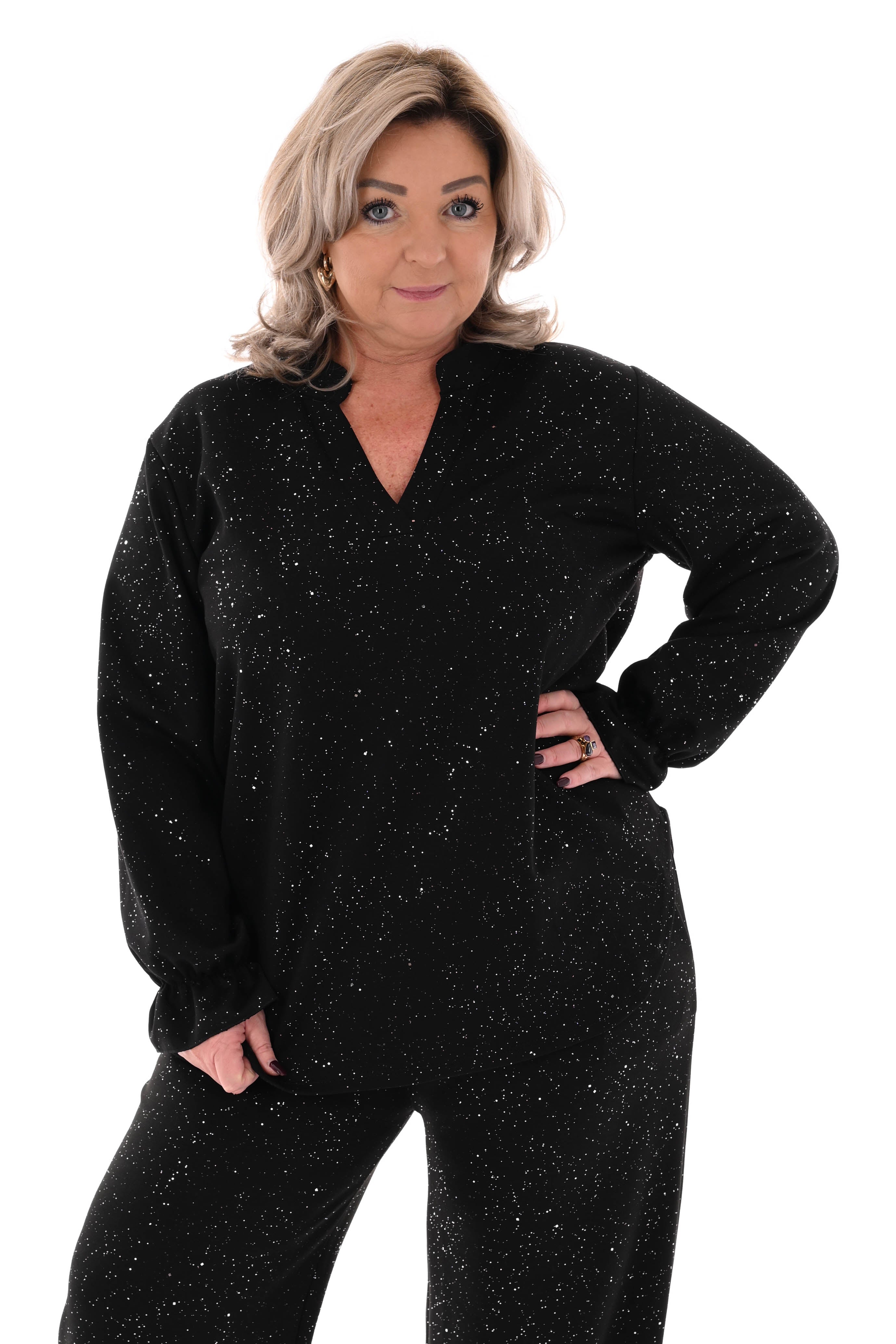 Tweedelig pak glitter flakes roezelmouwen zwart