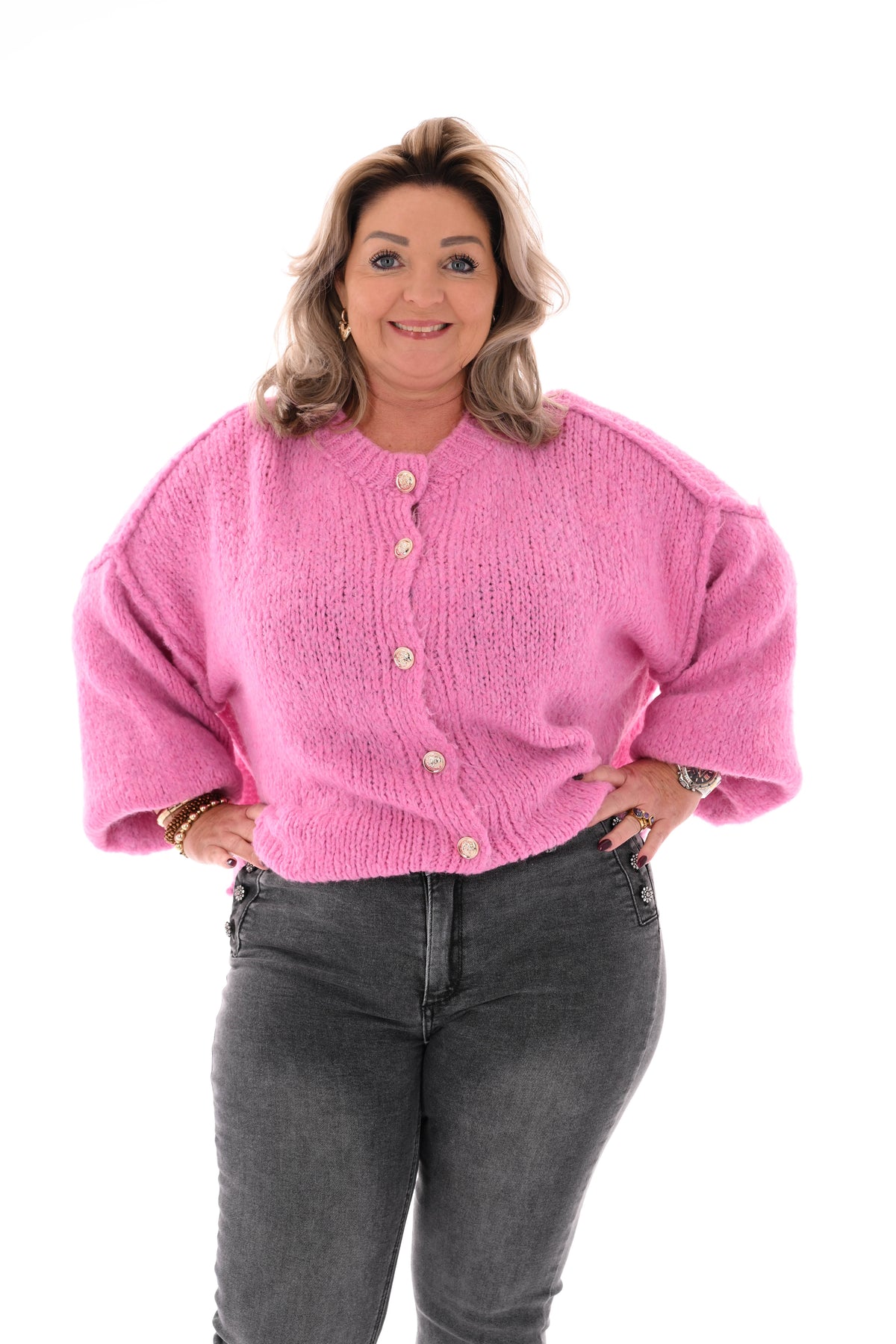 Grof gebreid vest met knopen roze