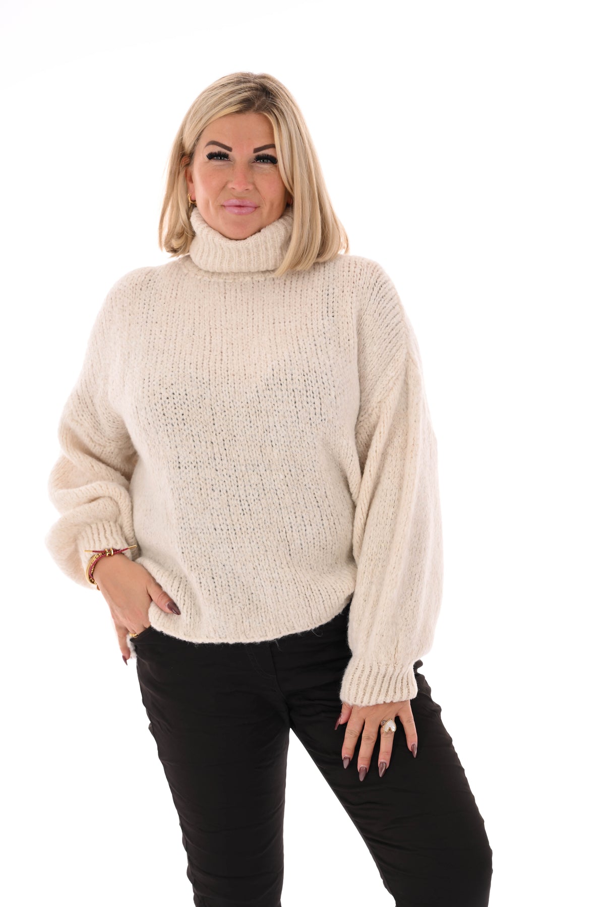 Coltrui grof gebreid roomwit