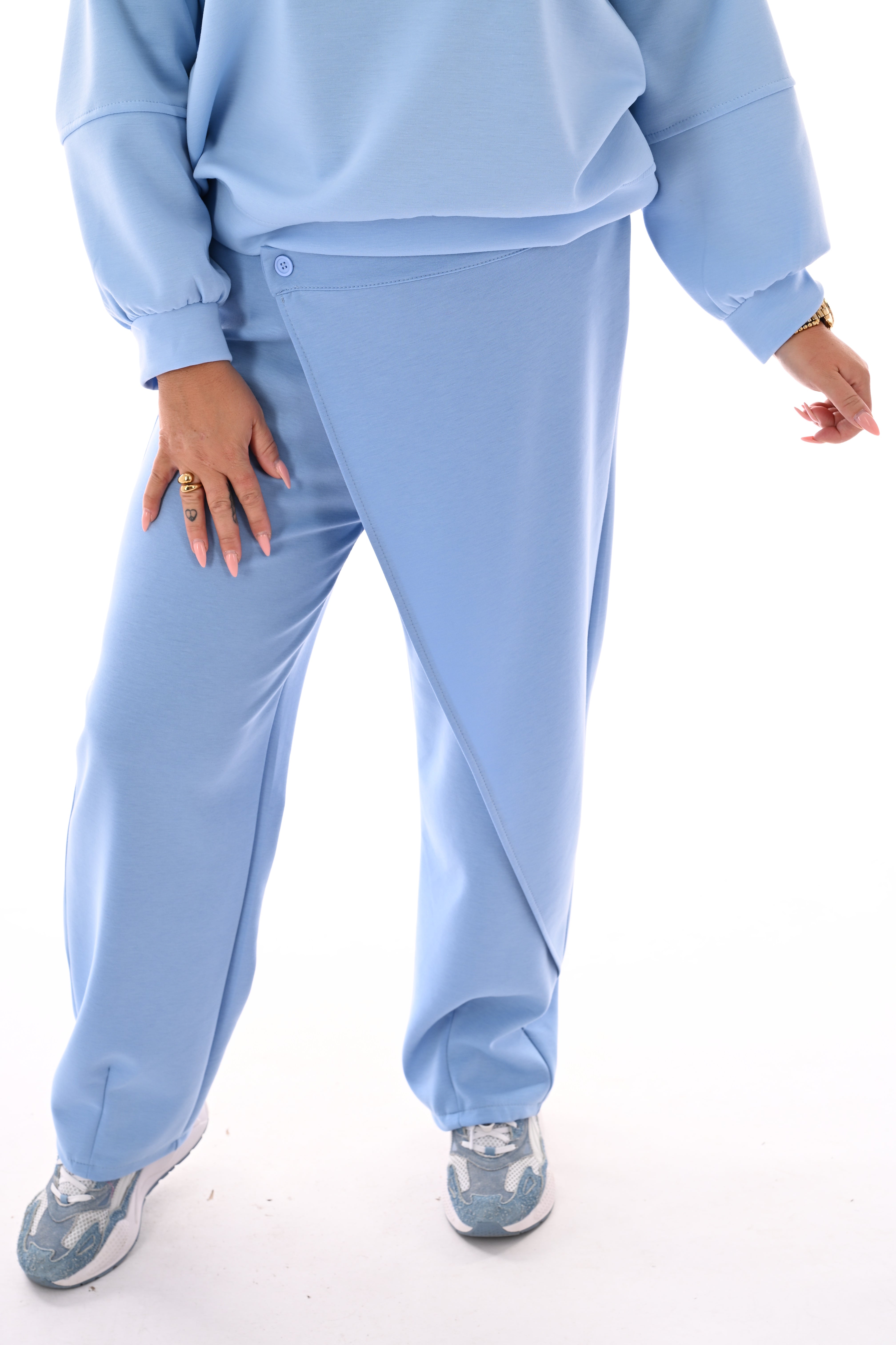 Broek schuine knoop lichtblauw