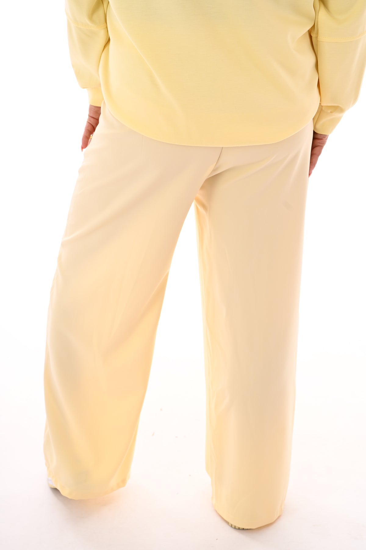 Wijde pantalon met elastieken taille botergeel