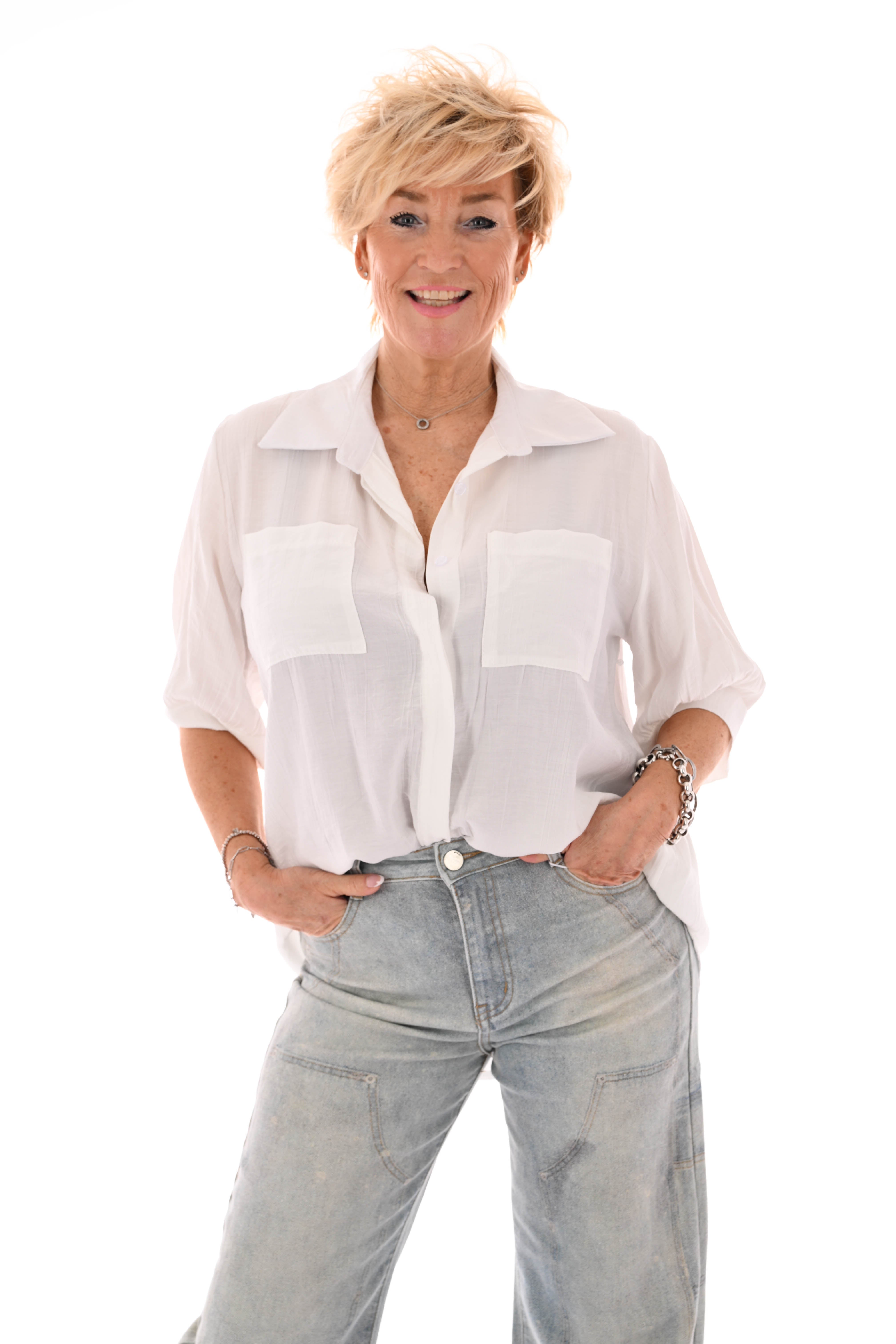 Doorknoop blouse met borstzakken uni roomwit