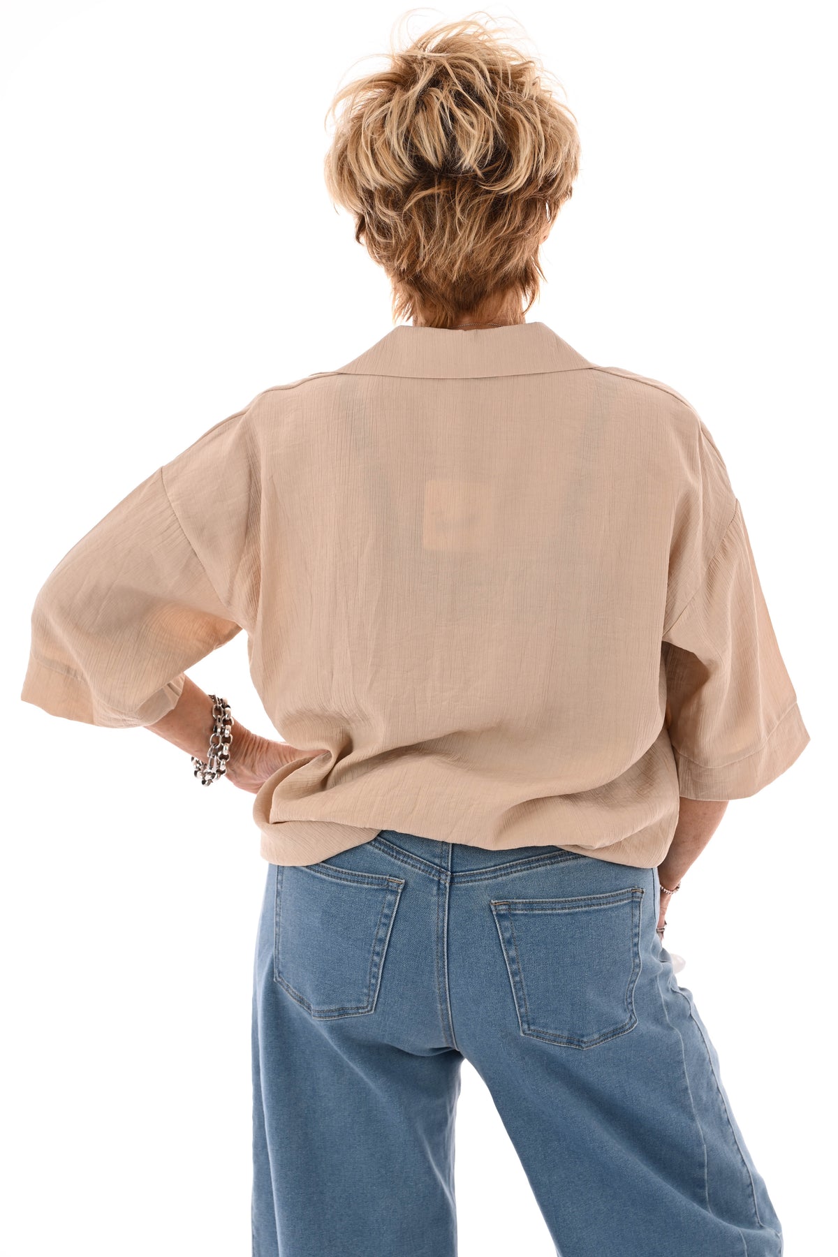 Blouse met roezel v-hals beige