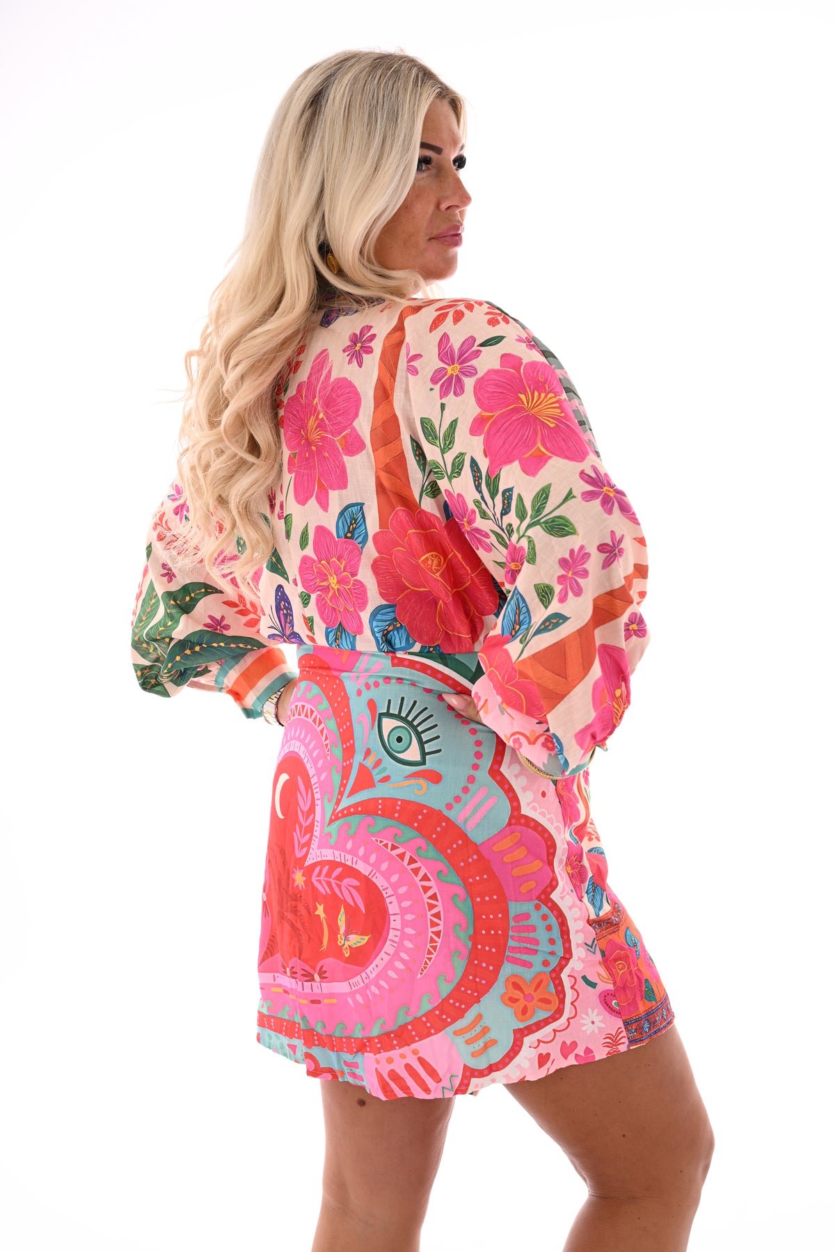 Korte wikkeljurk print bloemen fuchsia