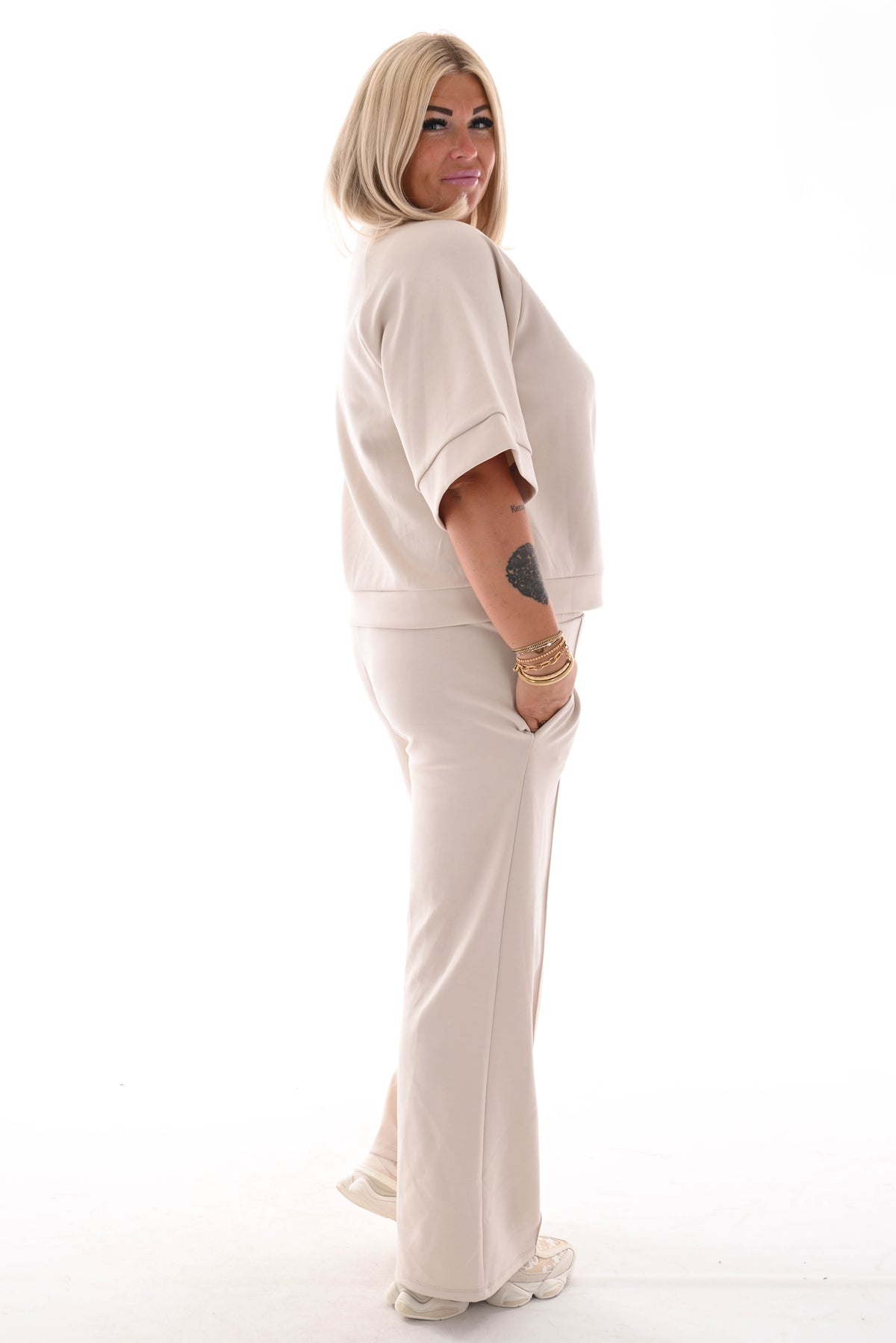 Tweedelig joggingspak applicatie wijde pijp beige