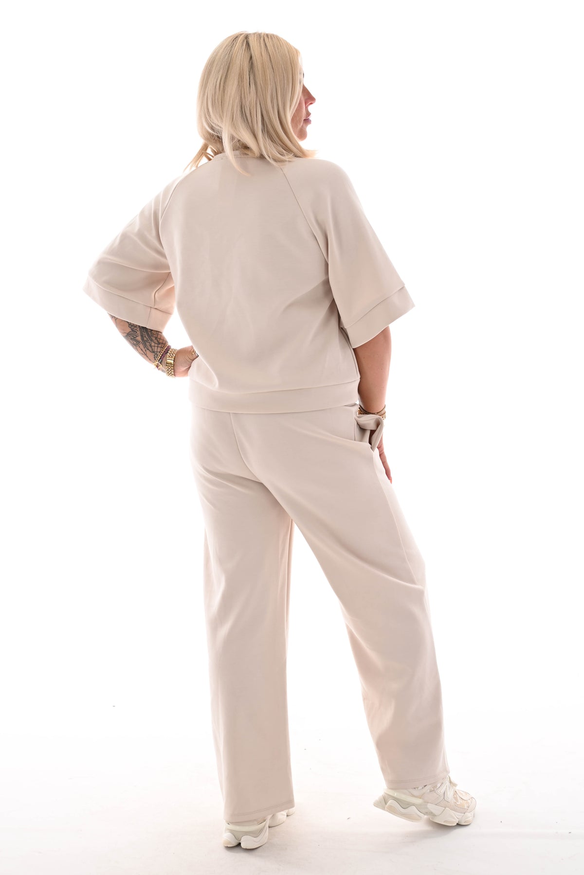 Tweedelig joggingspak applicatie wijde pijp beige
