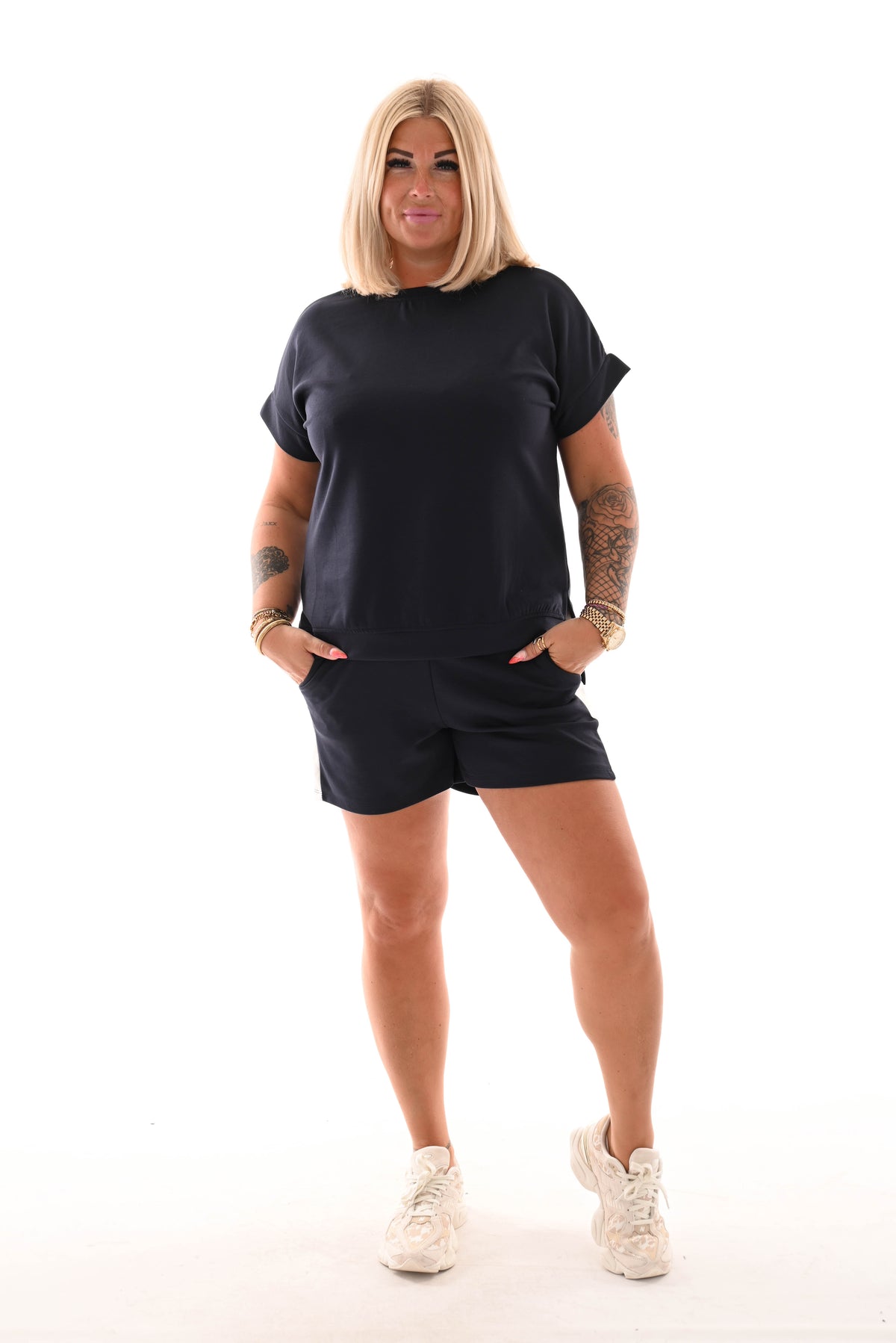 Tweedelig set short met bies marineblauw