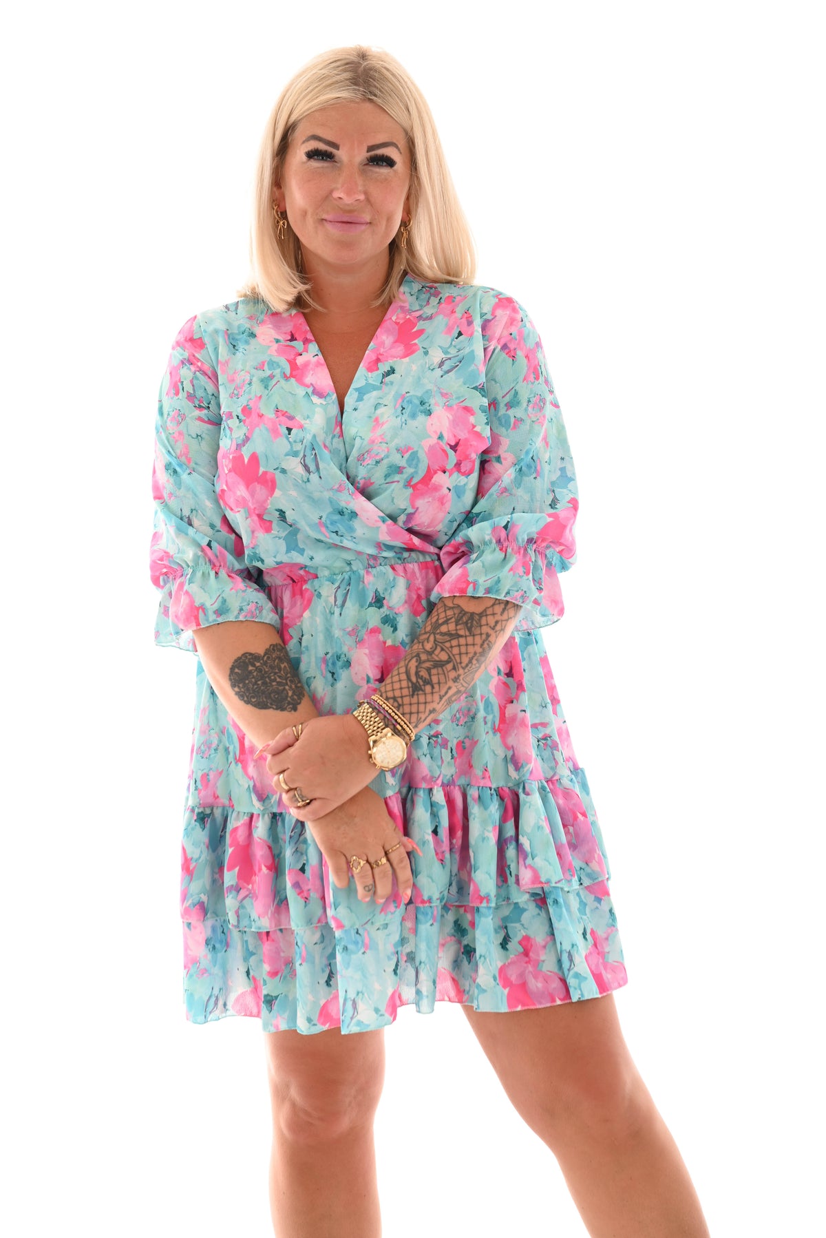 Korte jurk overslag roezels lichtblauw/roze