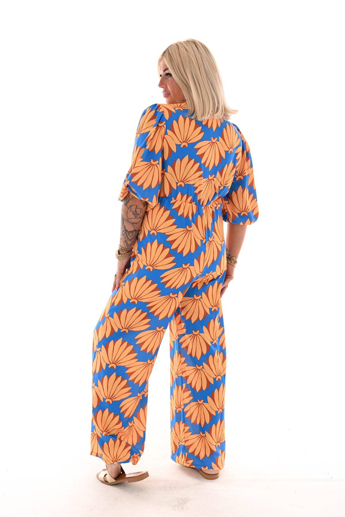 Jumpsuit overslag print bloemen kobaltblauw/geel