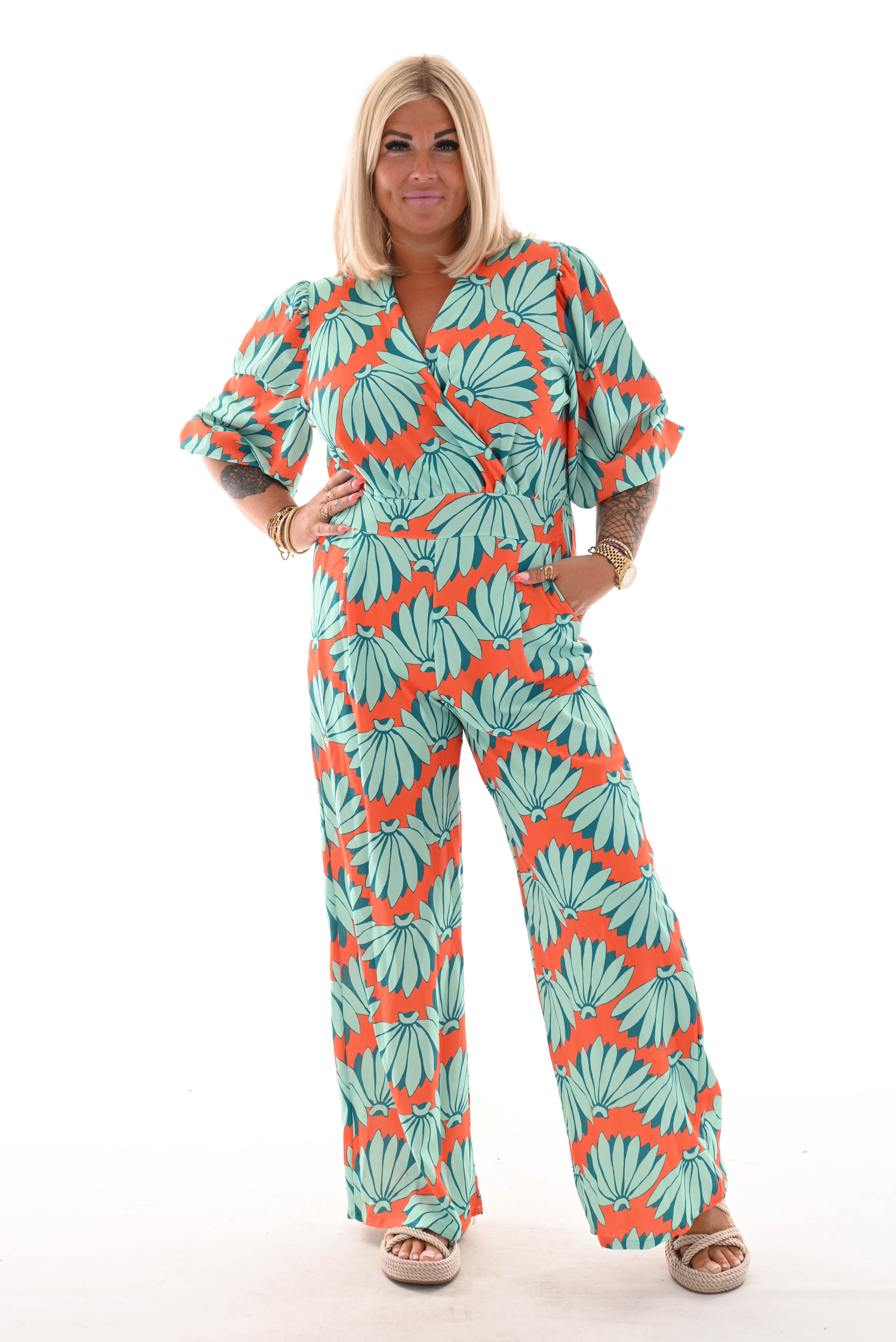 Jumpsuit overslag print bloemen oranje/turquoise