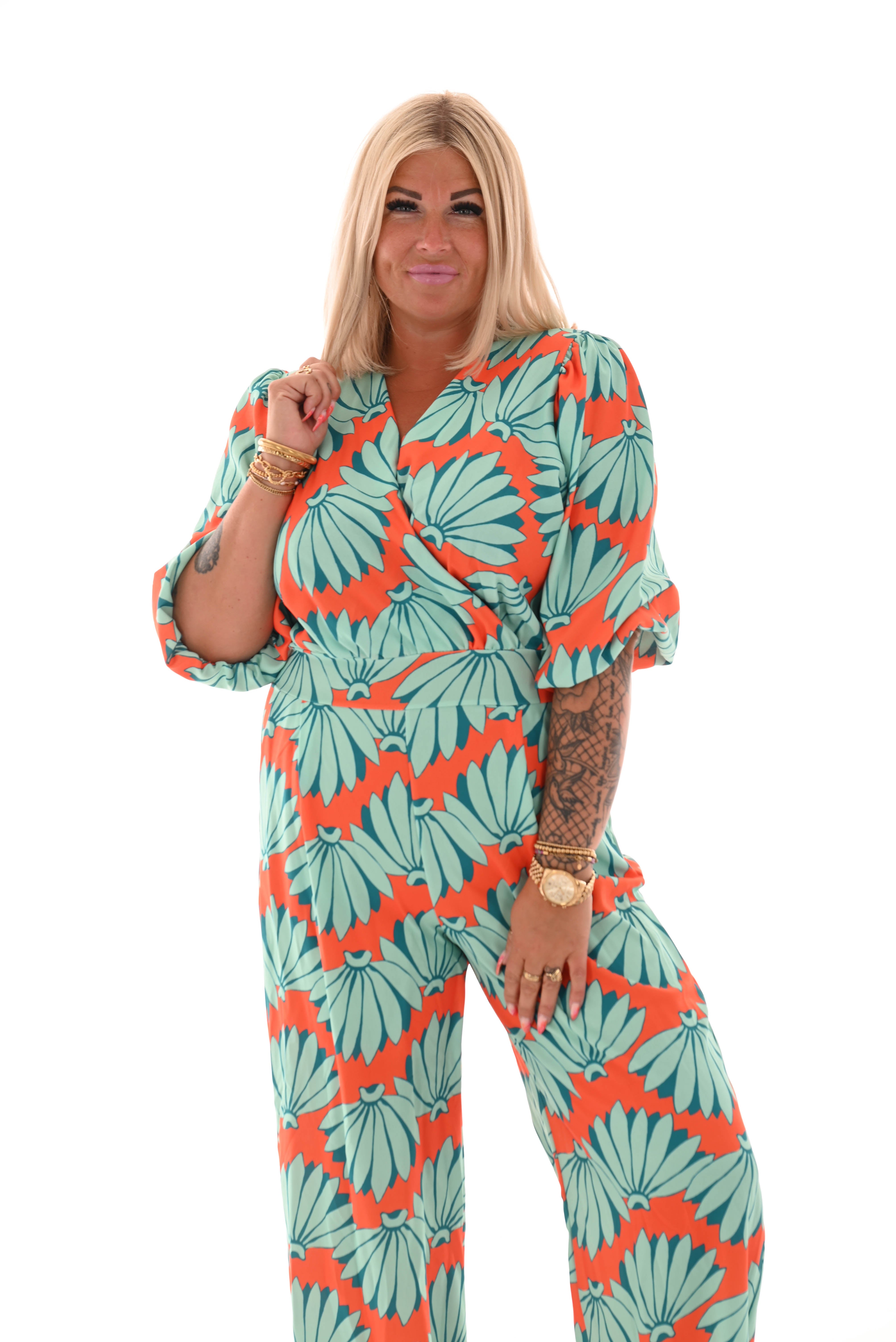 Jumpsuit overslag print bloemen oranje/turquoise