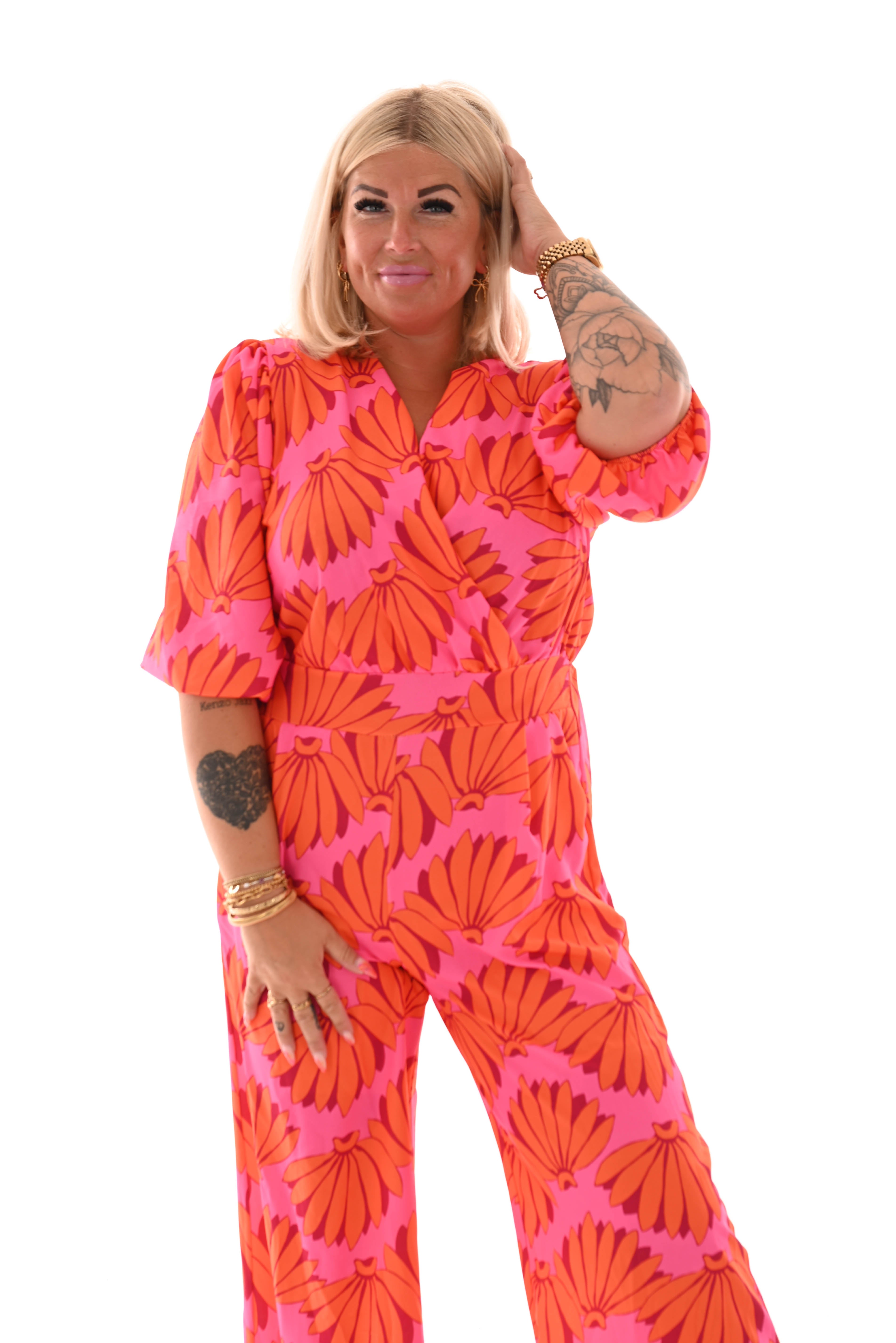 Jumpsuit overslag print bloemen roze/oranje