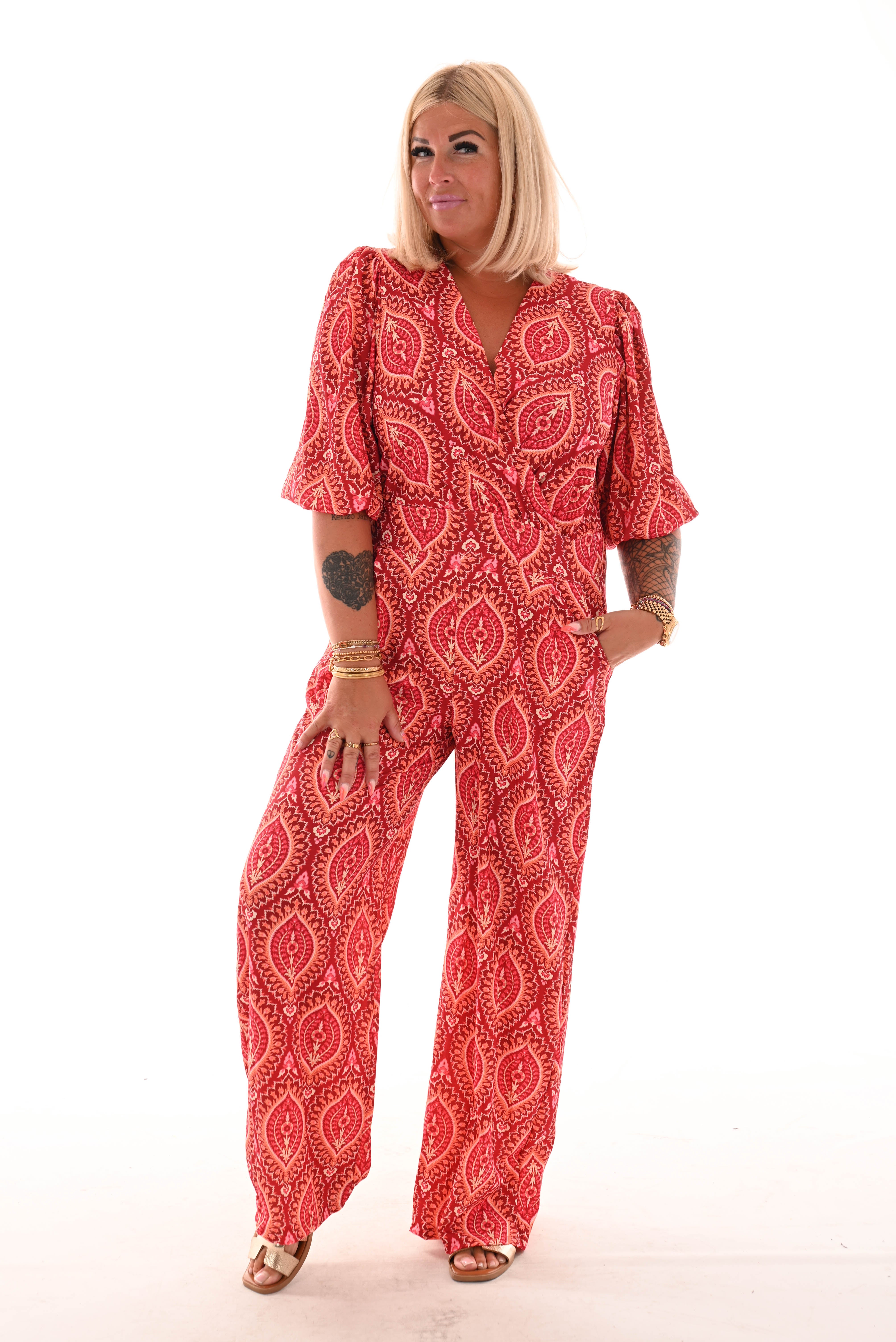Jumpsuit overslag print paisley brick/oranje
