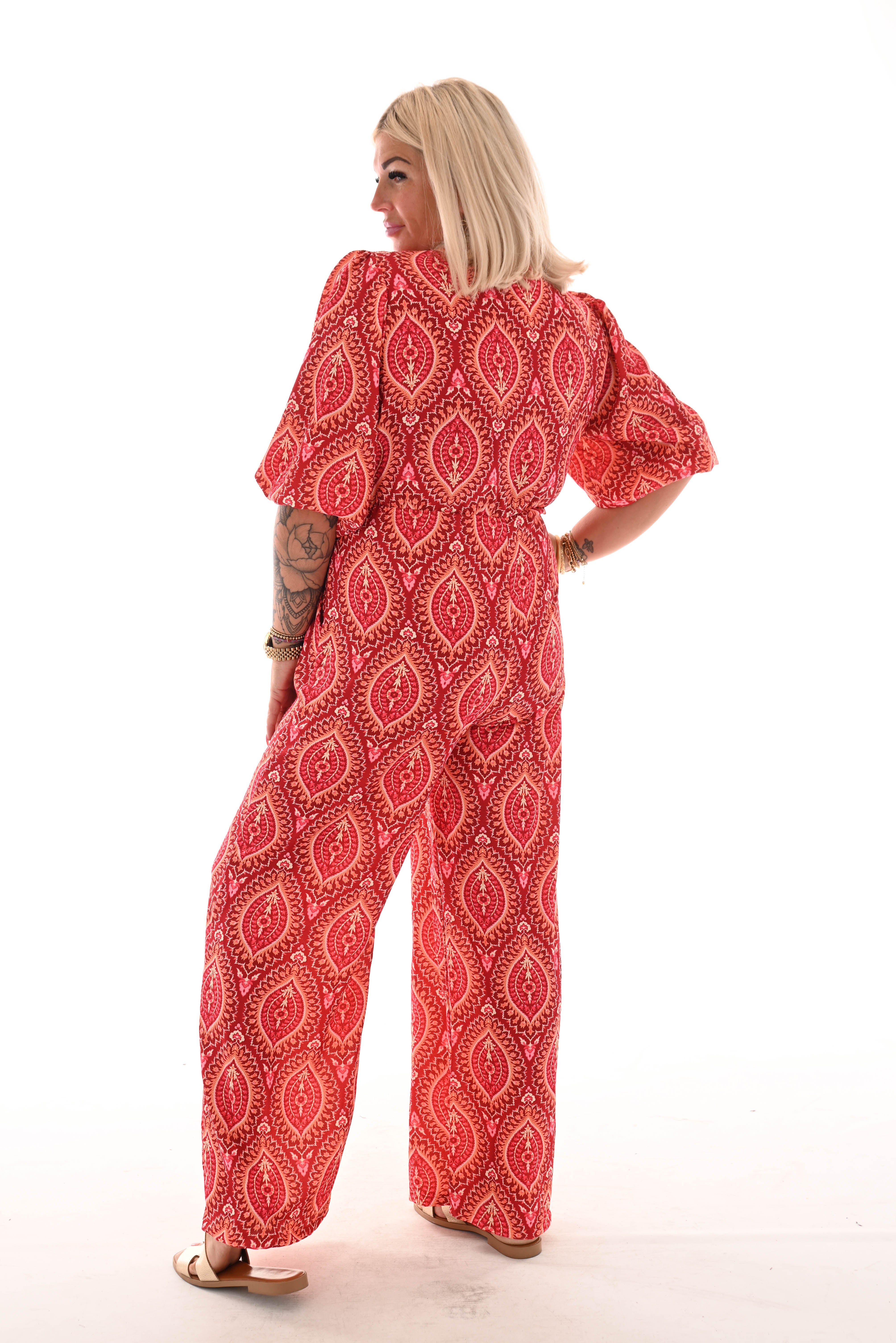 Jumpsuit overslag print paisley brick/oranje