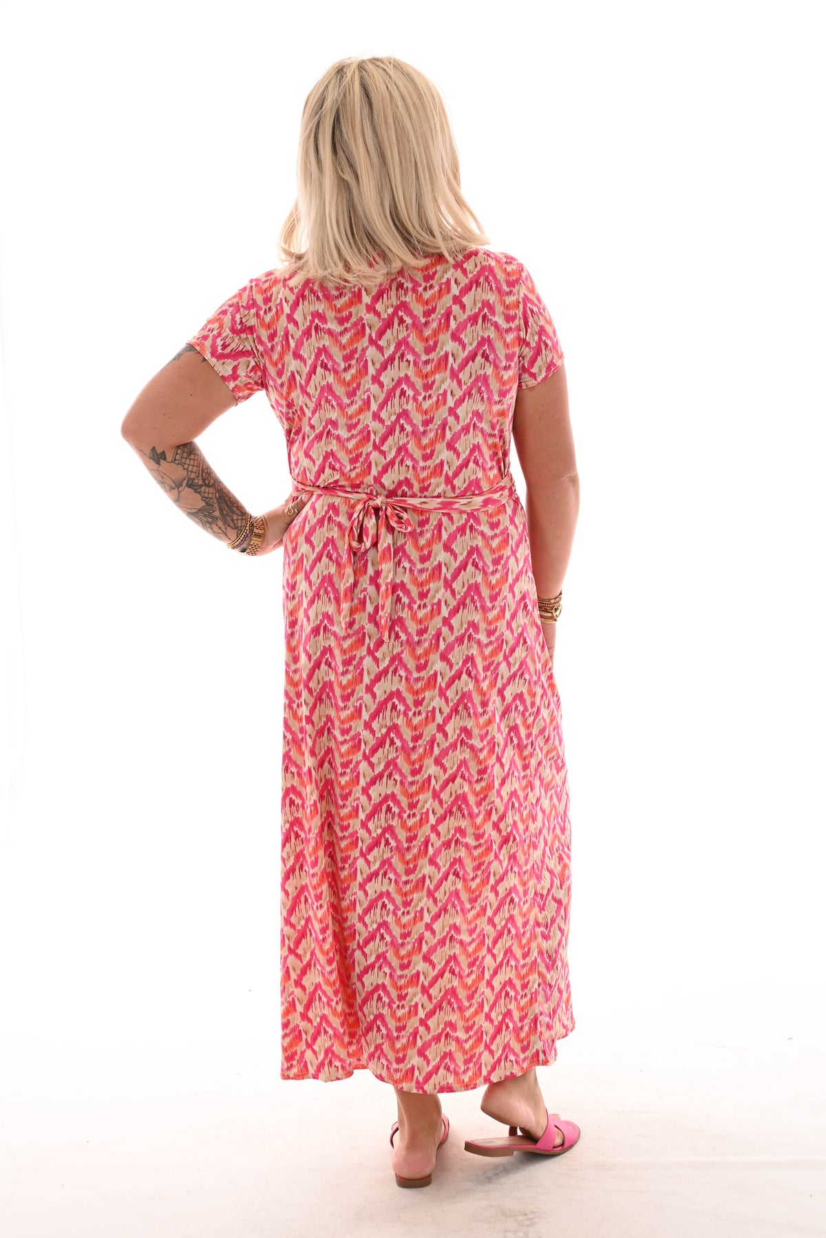 Lange jurk knoopdetail print vegen fuchsia
