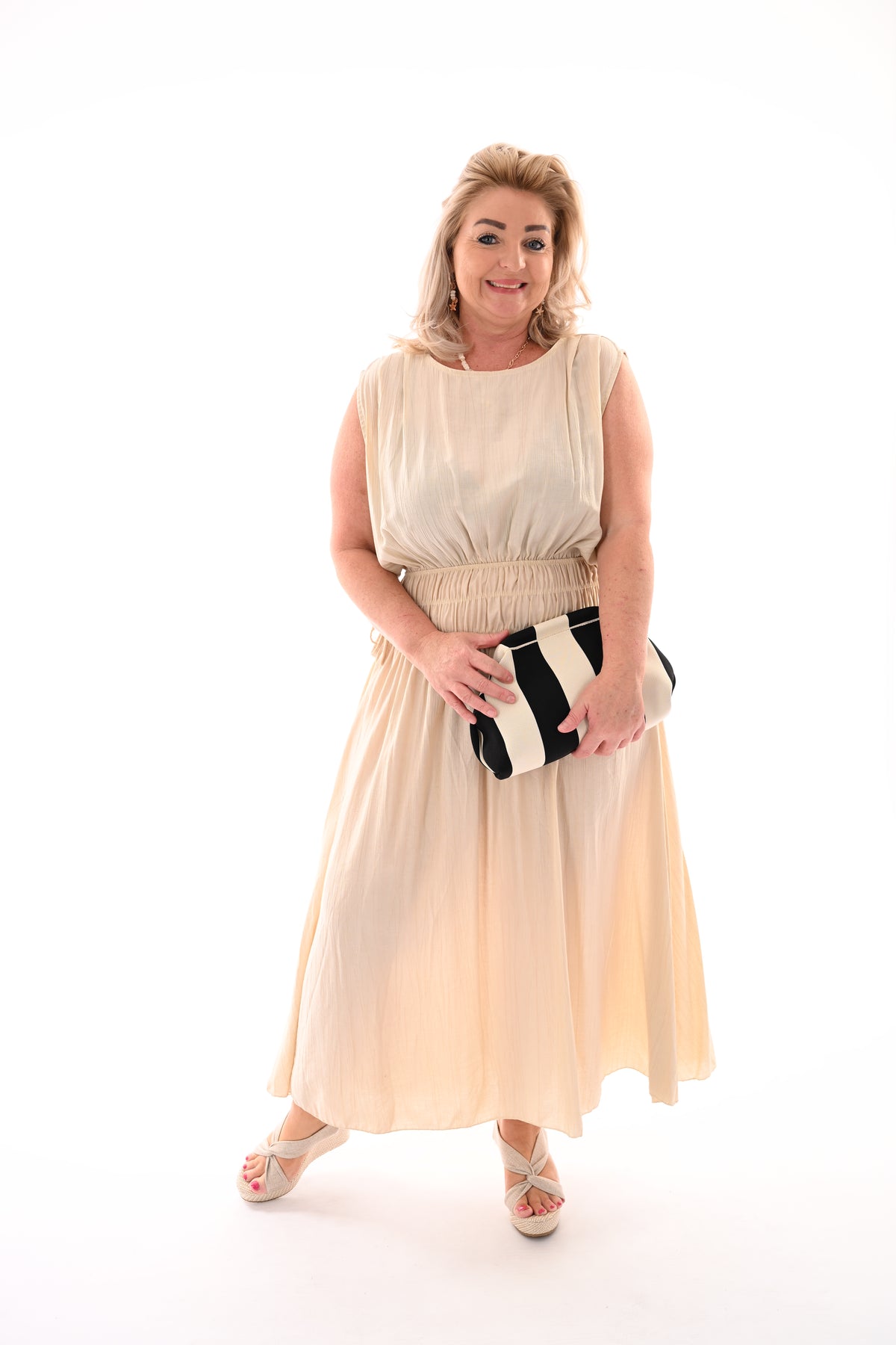 Lange jurk gedrapeerde taille beige