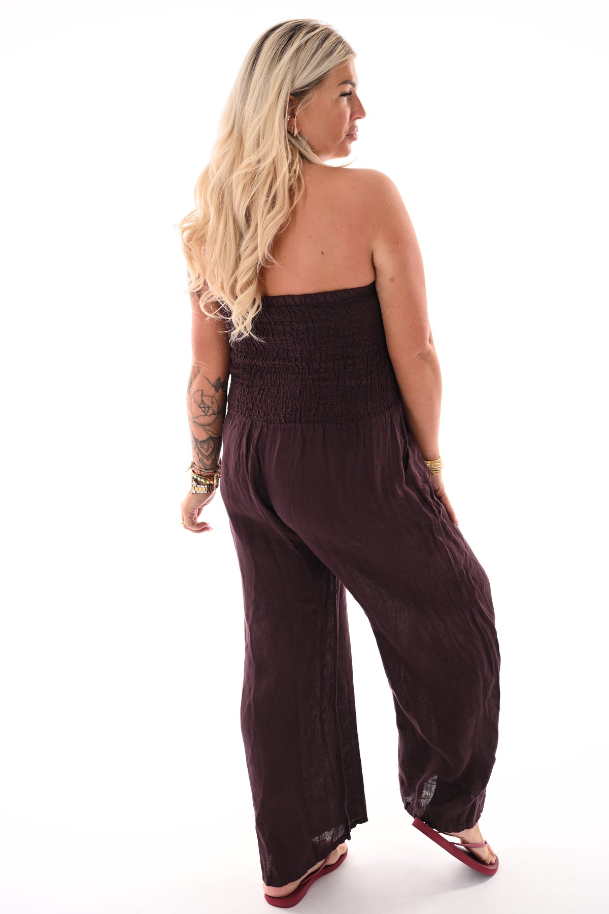 Off-shoulder jumpsuit smock detail aubergine