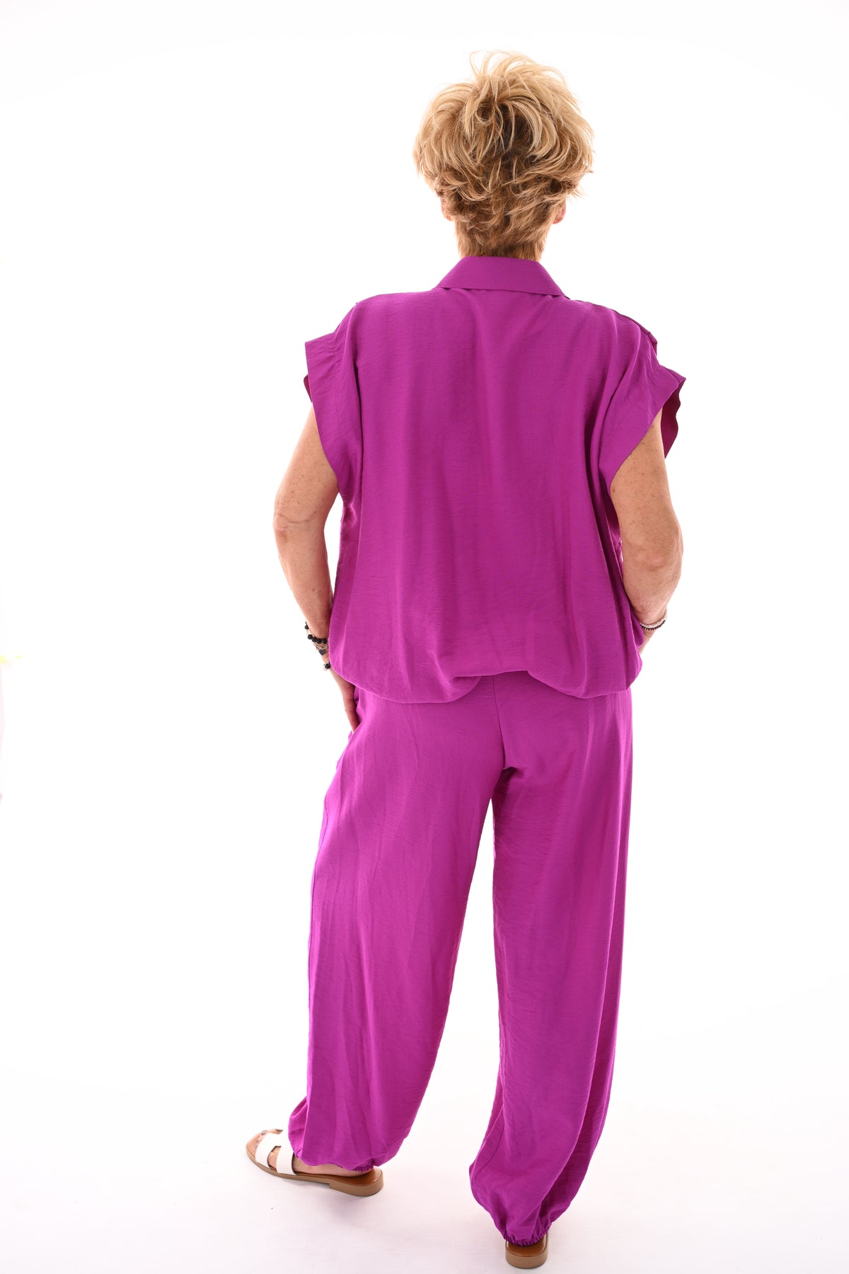 Tweedelig set doorknoop blouse kapmouwen cyclaam
