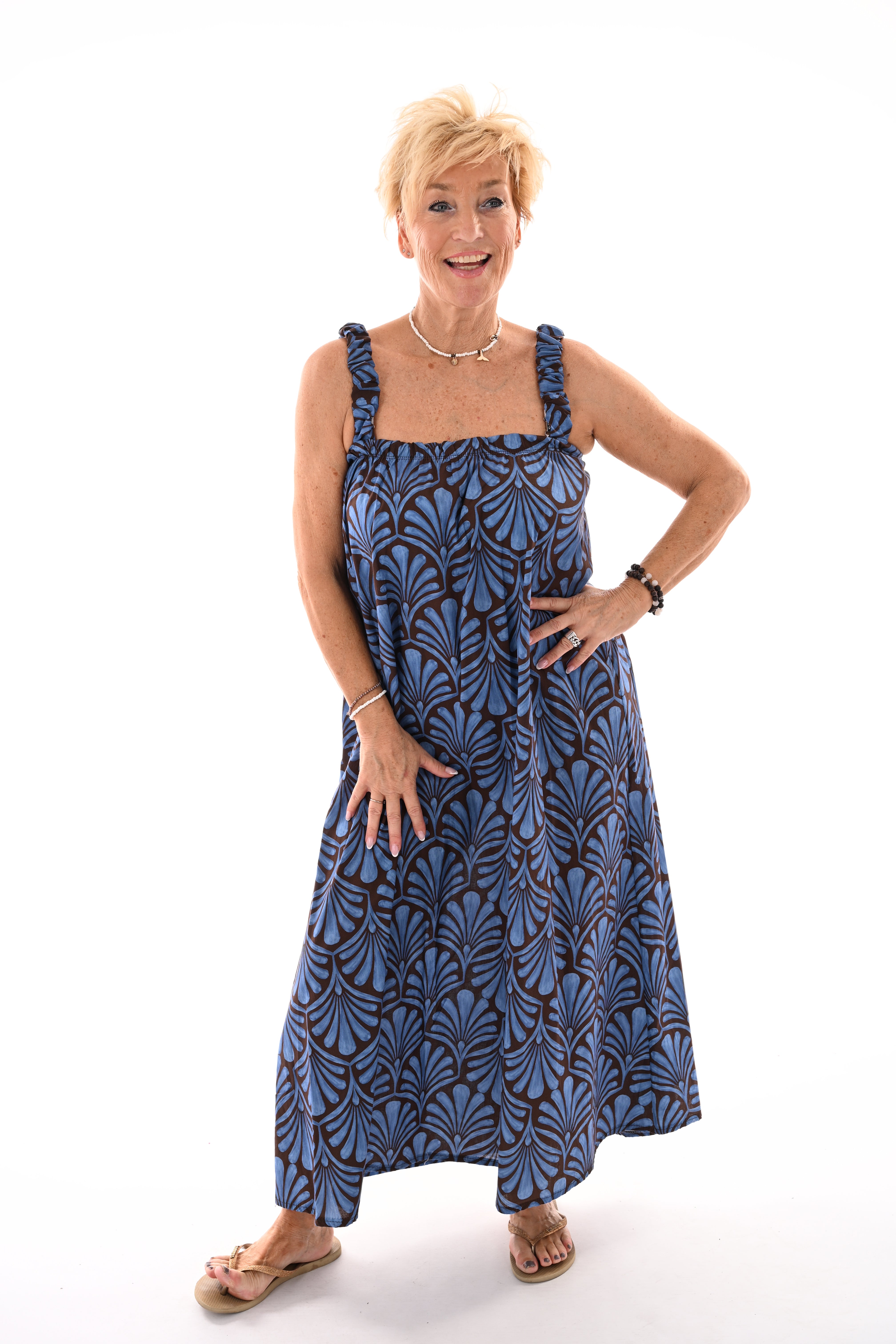 Lange jurk mouwloos bladprint blauw/donkerbruin