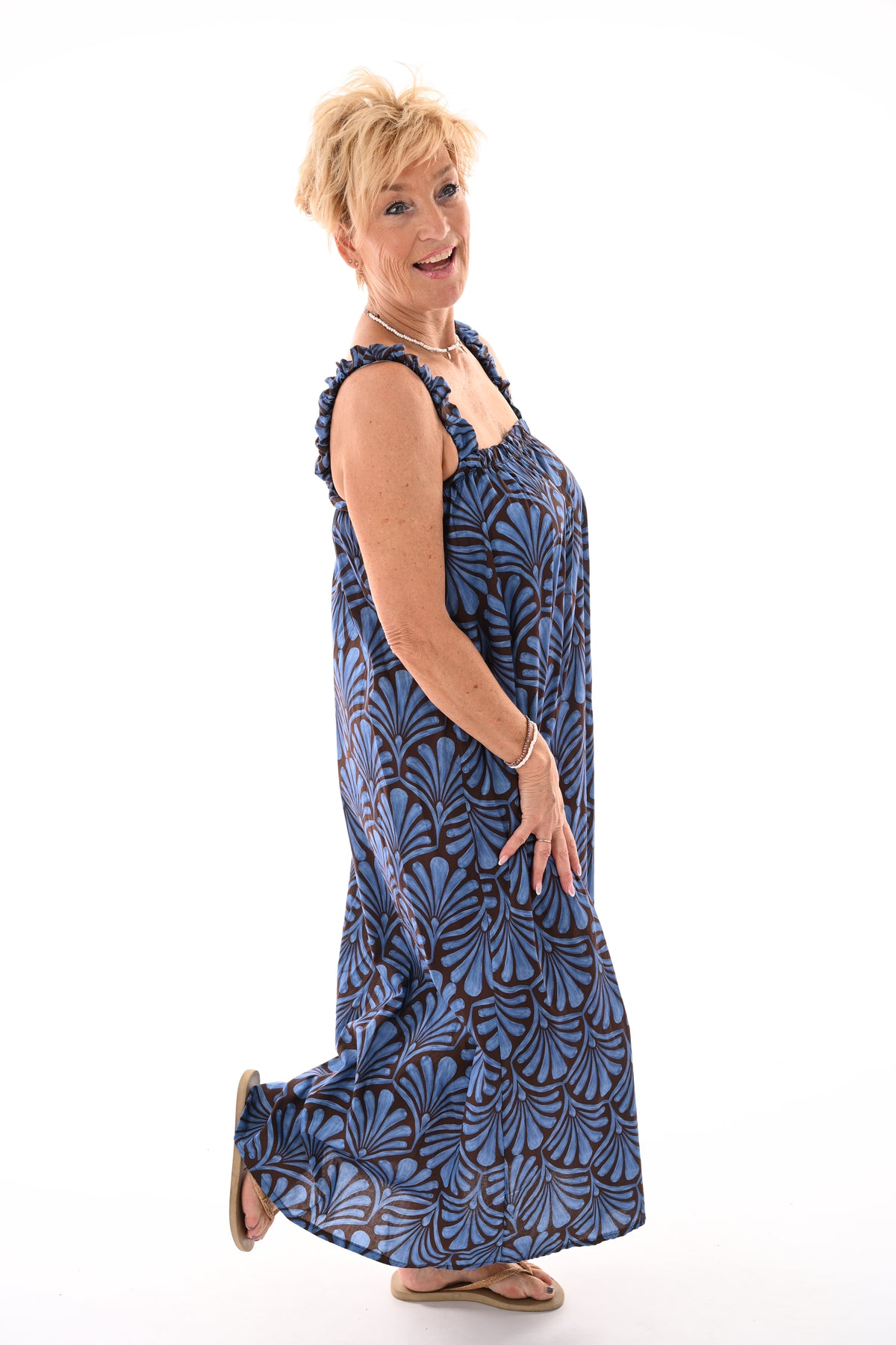 Lange jurk mouwloos bladprint blauw/donkerbruin
