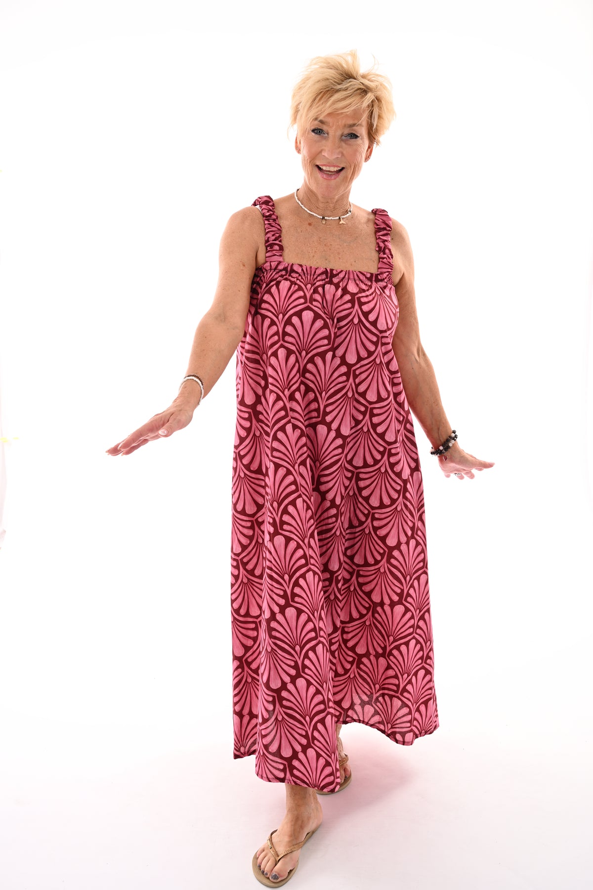 Lange jurk mouwloos bladprint roze/bordeaux