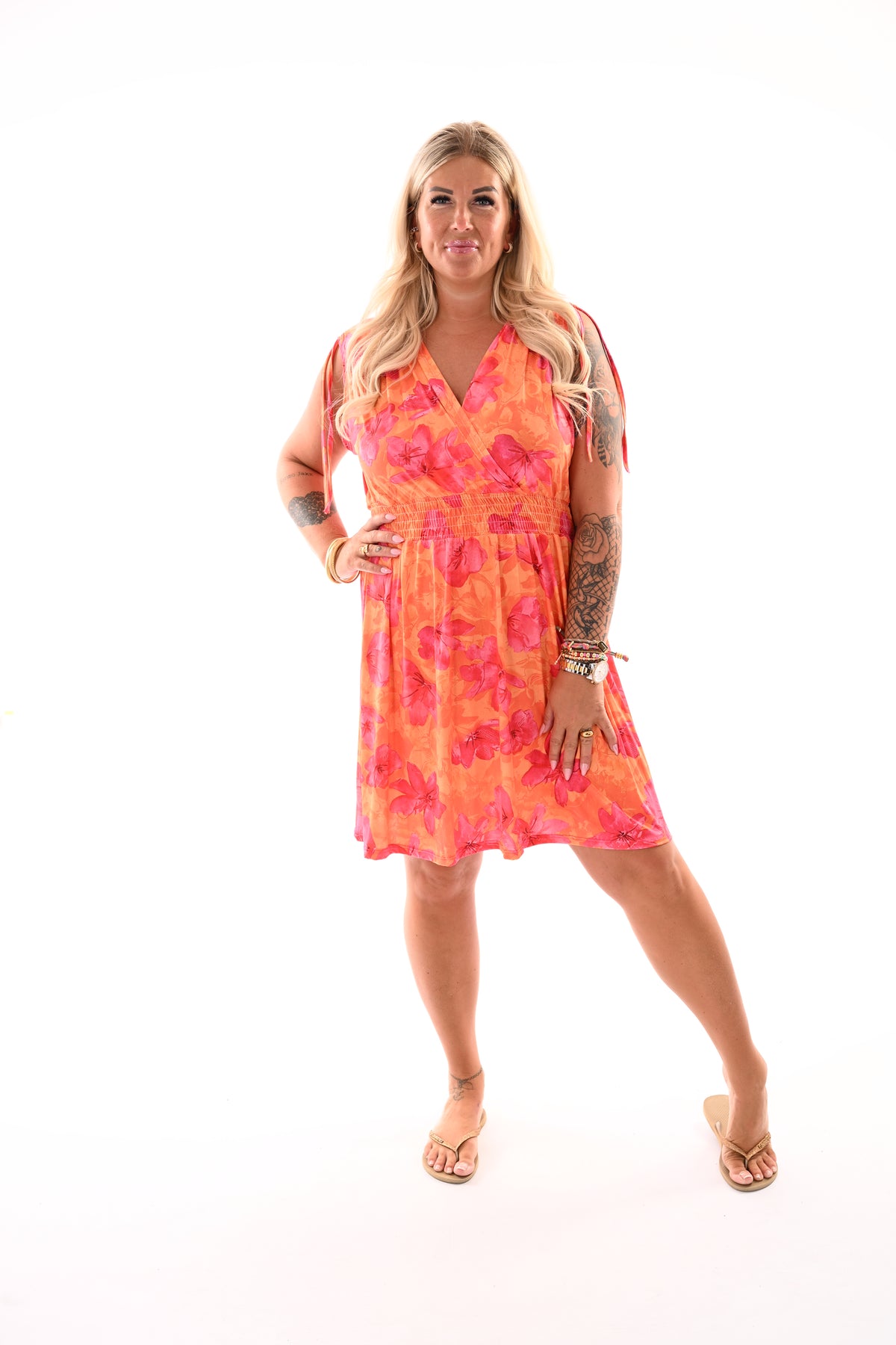Korte jurk magic print bloemen oranje/roze