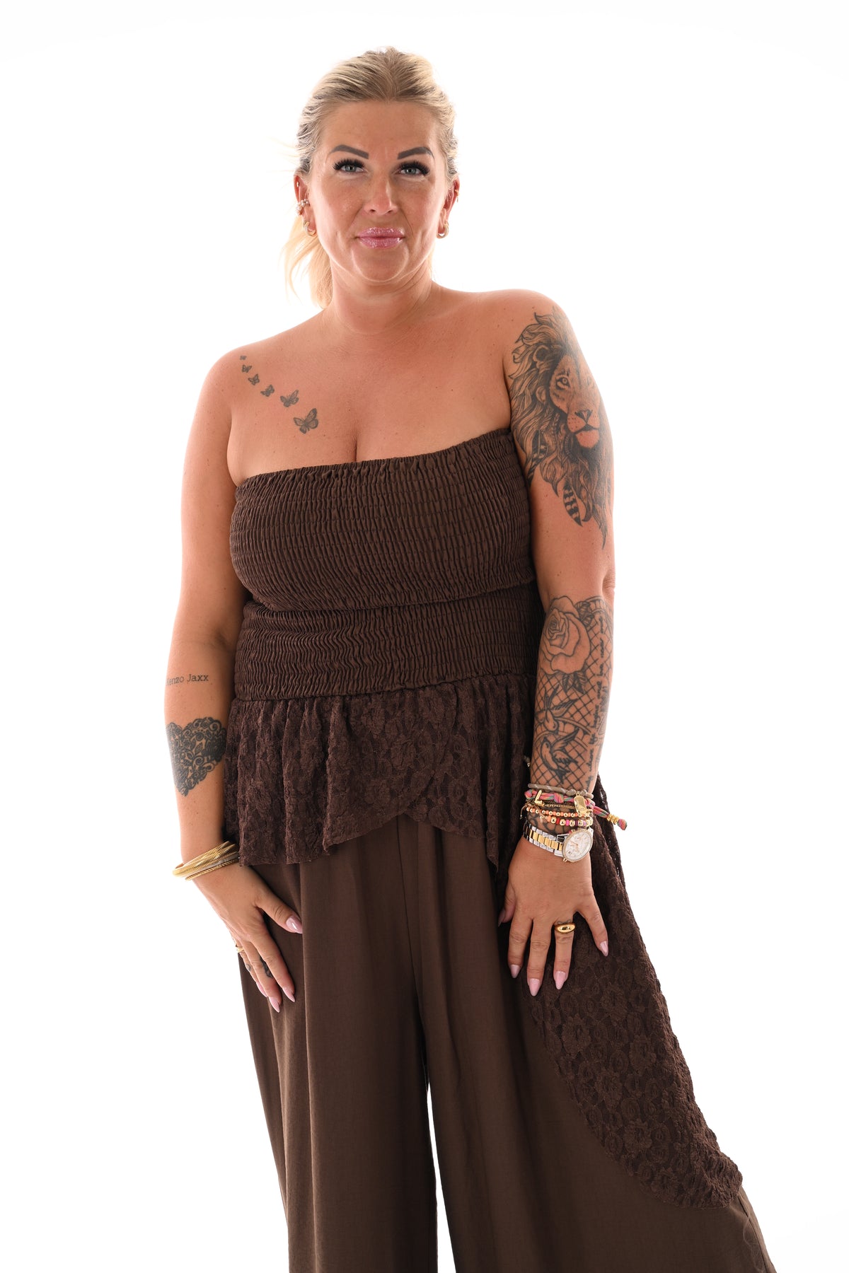 Off-shoulder jumpsuit kanten detail bruin