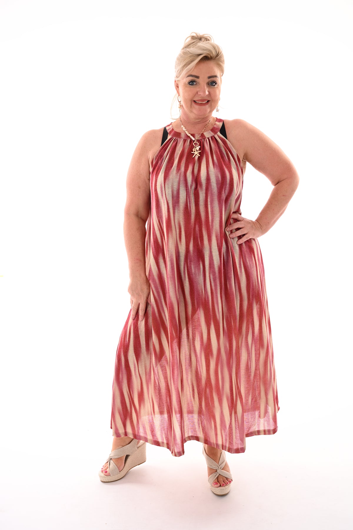 Halter jurk vloeiende lijnen roze