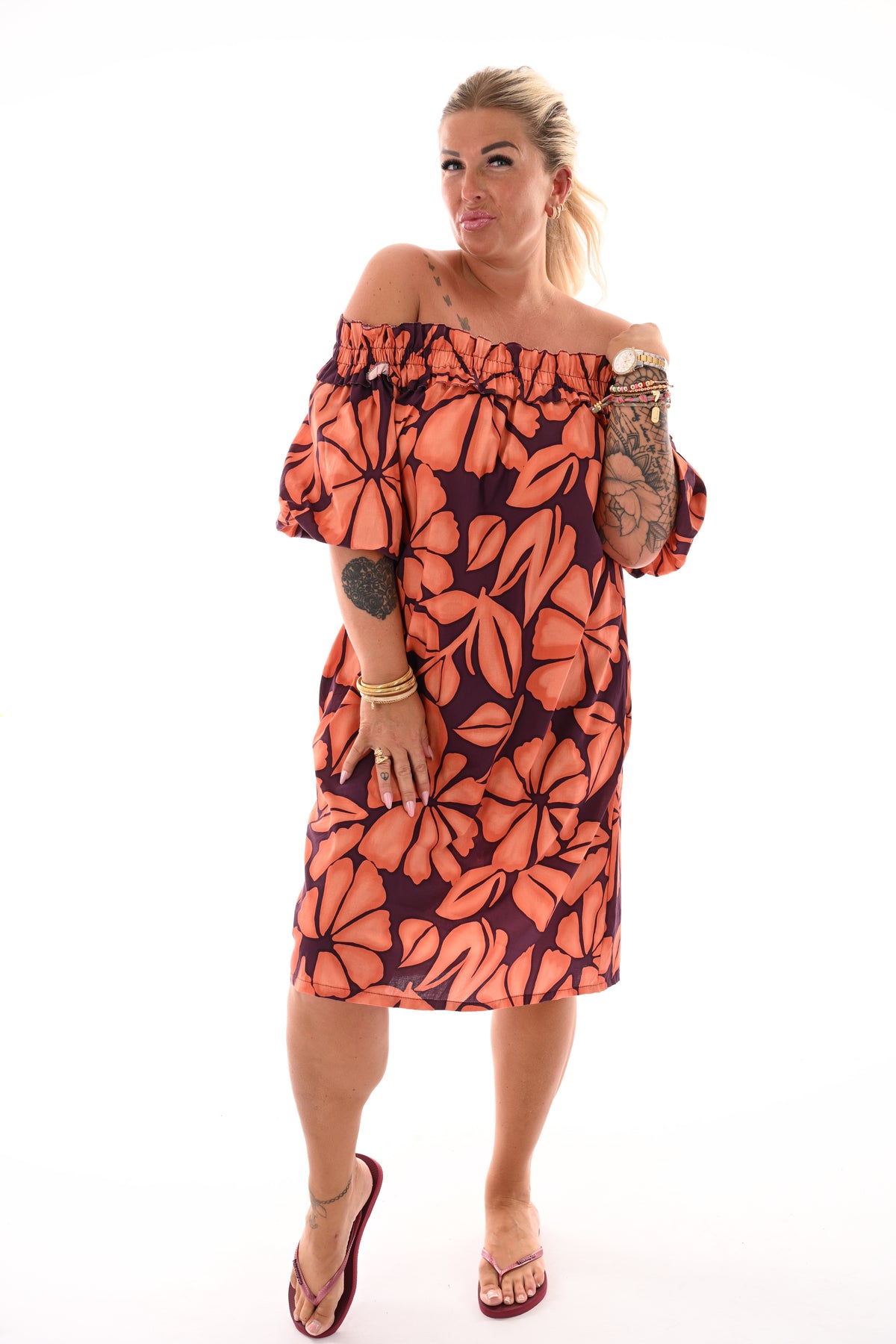 Jurk off-shoulder bladeren aubergine/oranje