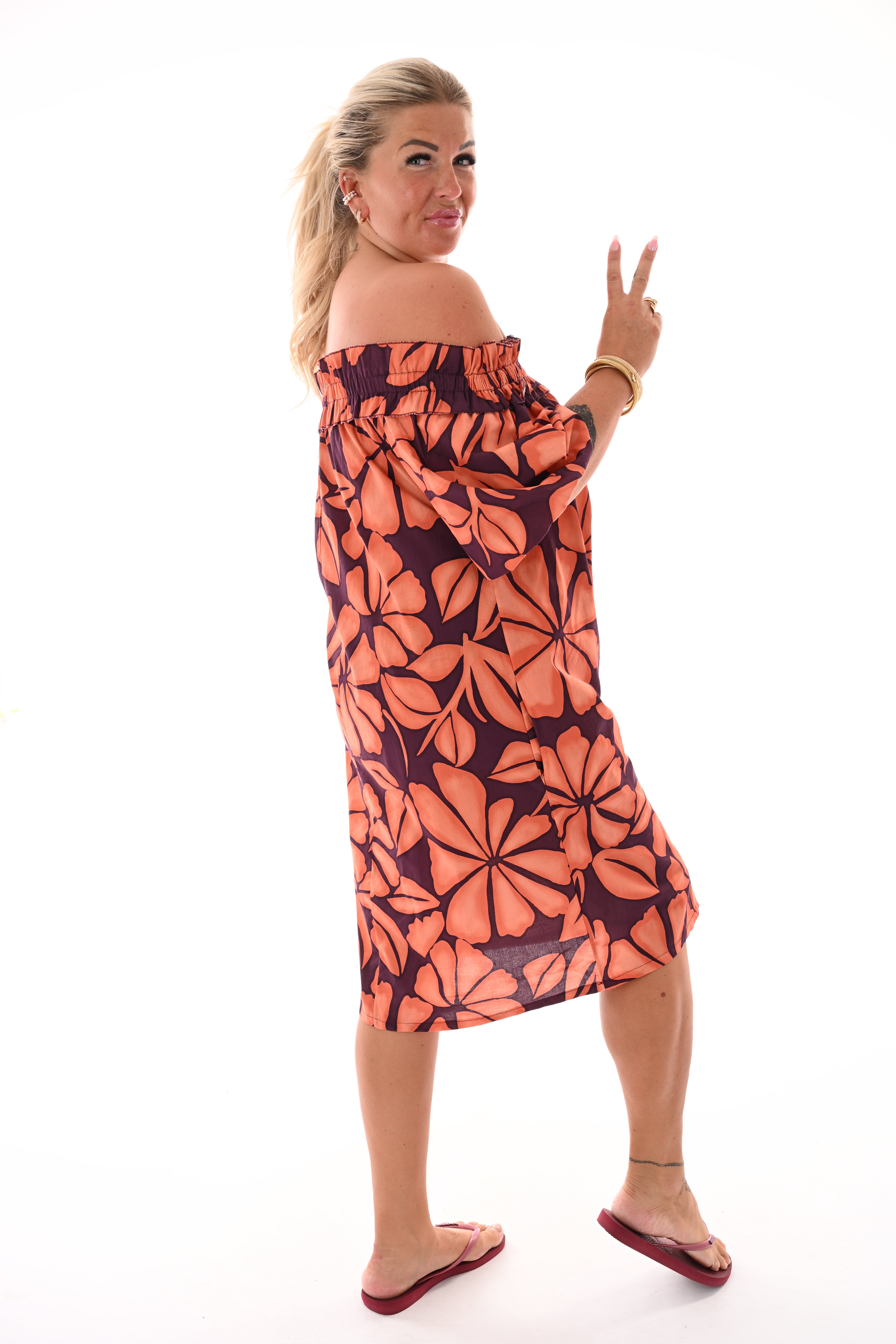 Jurk off-shoulder bladeren aubergine/oranje