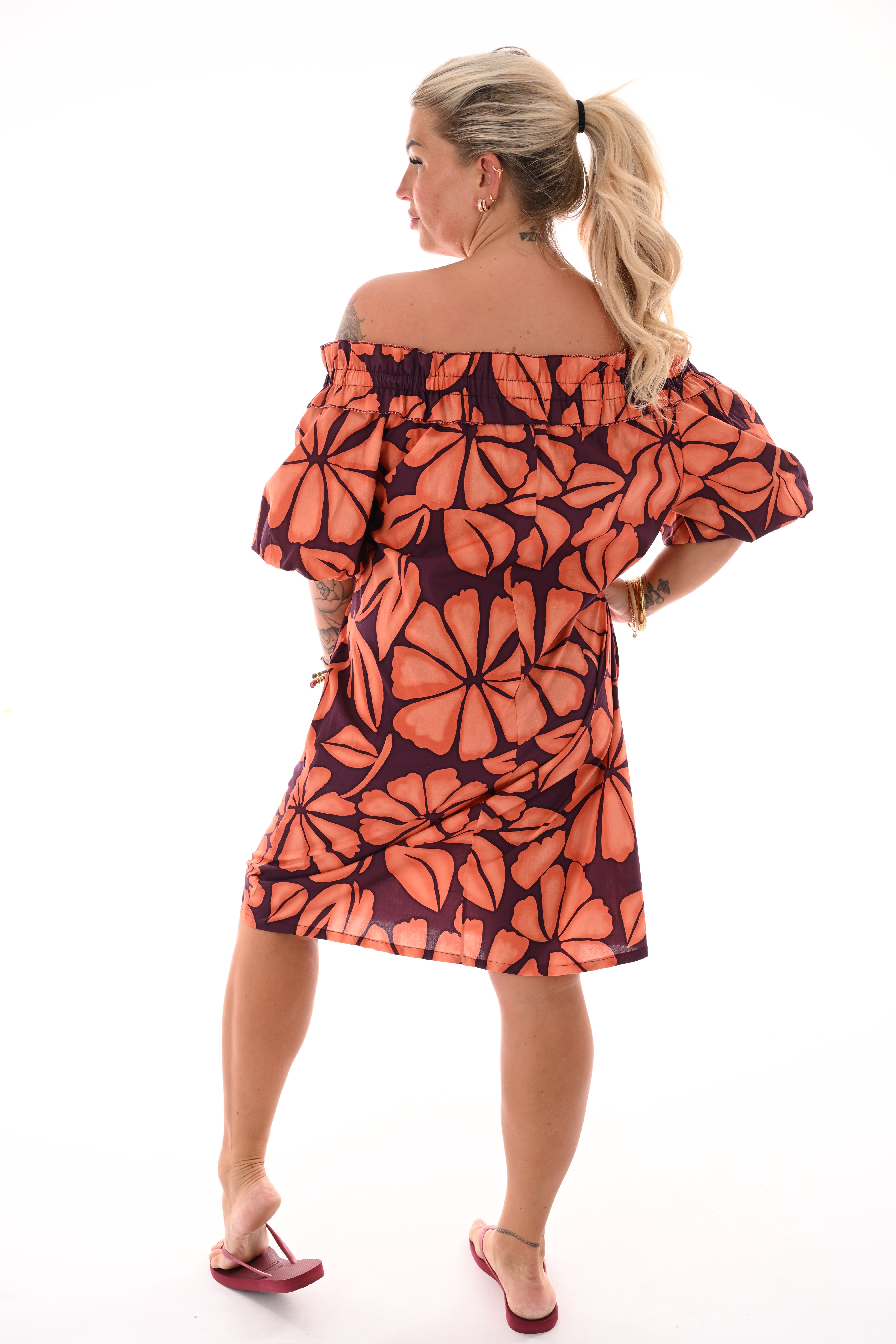 Jurk off-shoulder bladeren aubergine/oranje