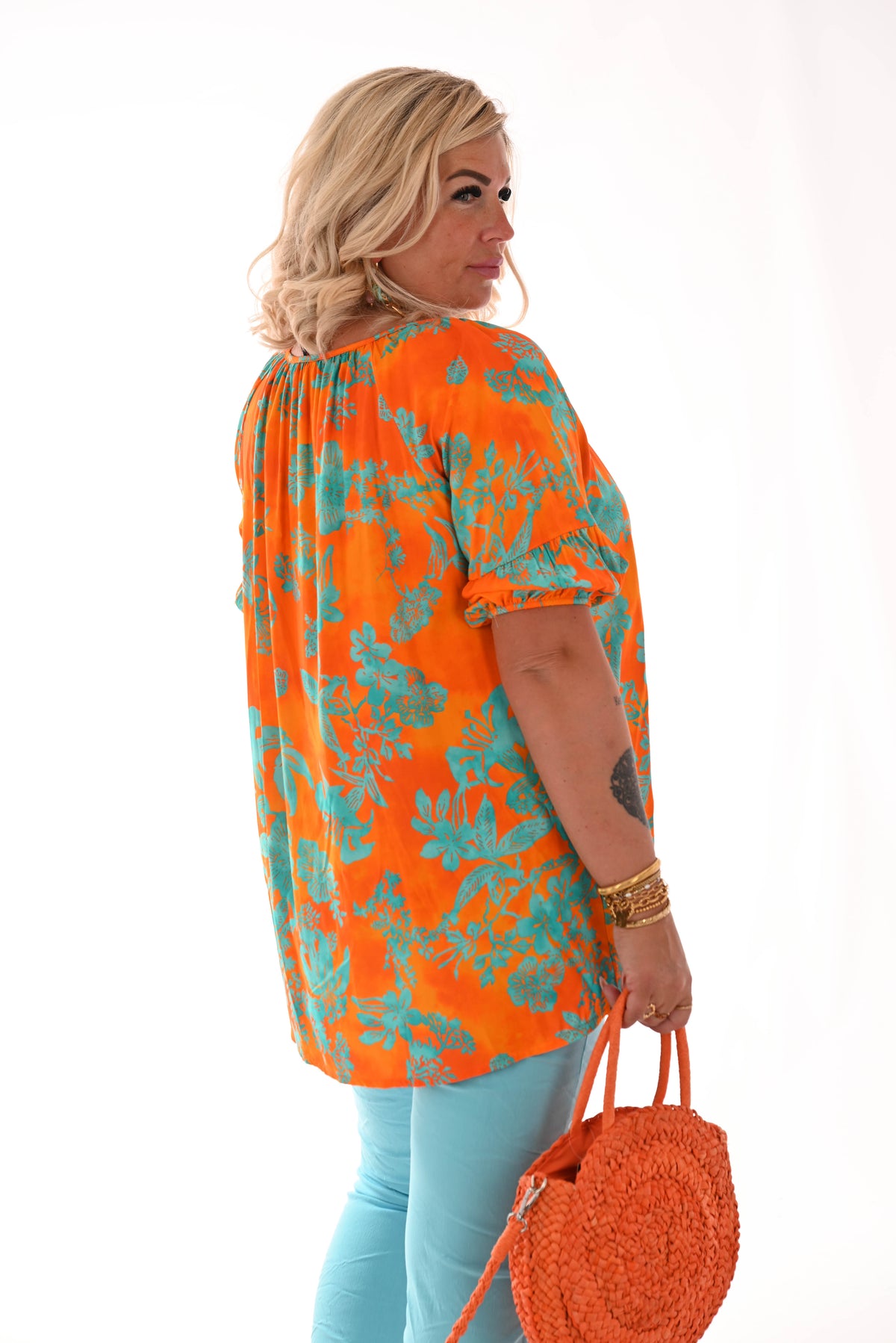 Doorknoop top pofmouwen bloemenprint oranje/turquoise