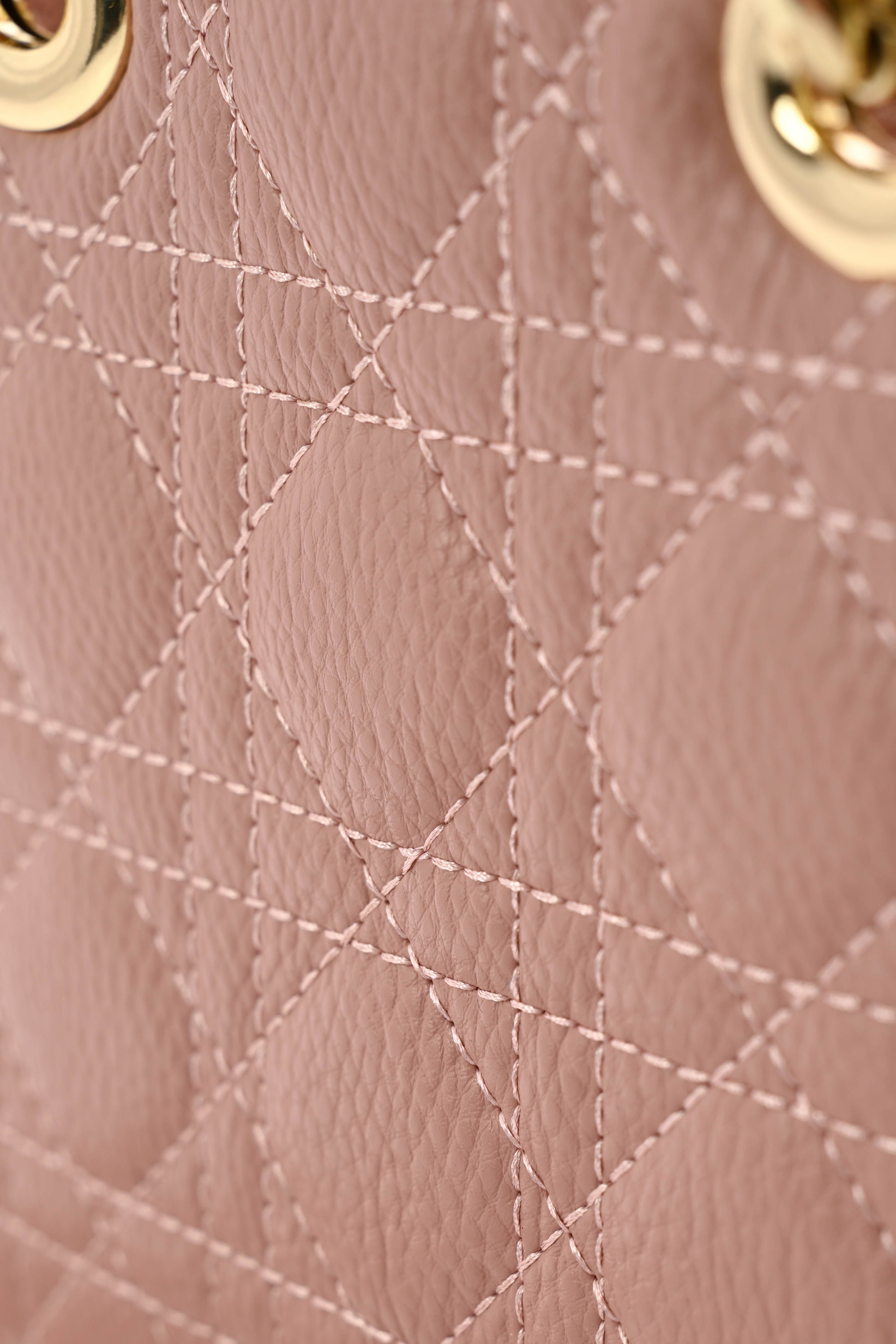 Handtas met licht geruit patroon oudroze