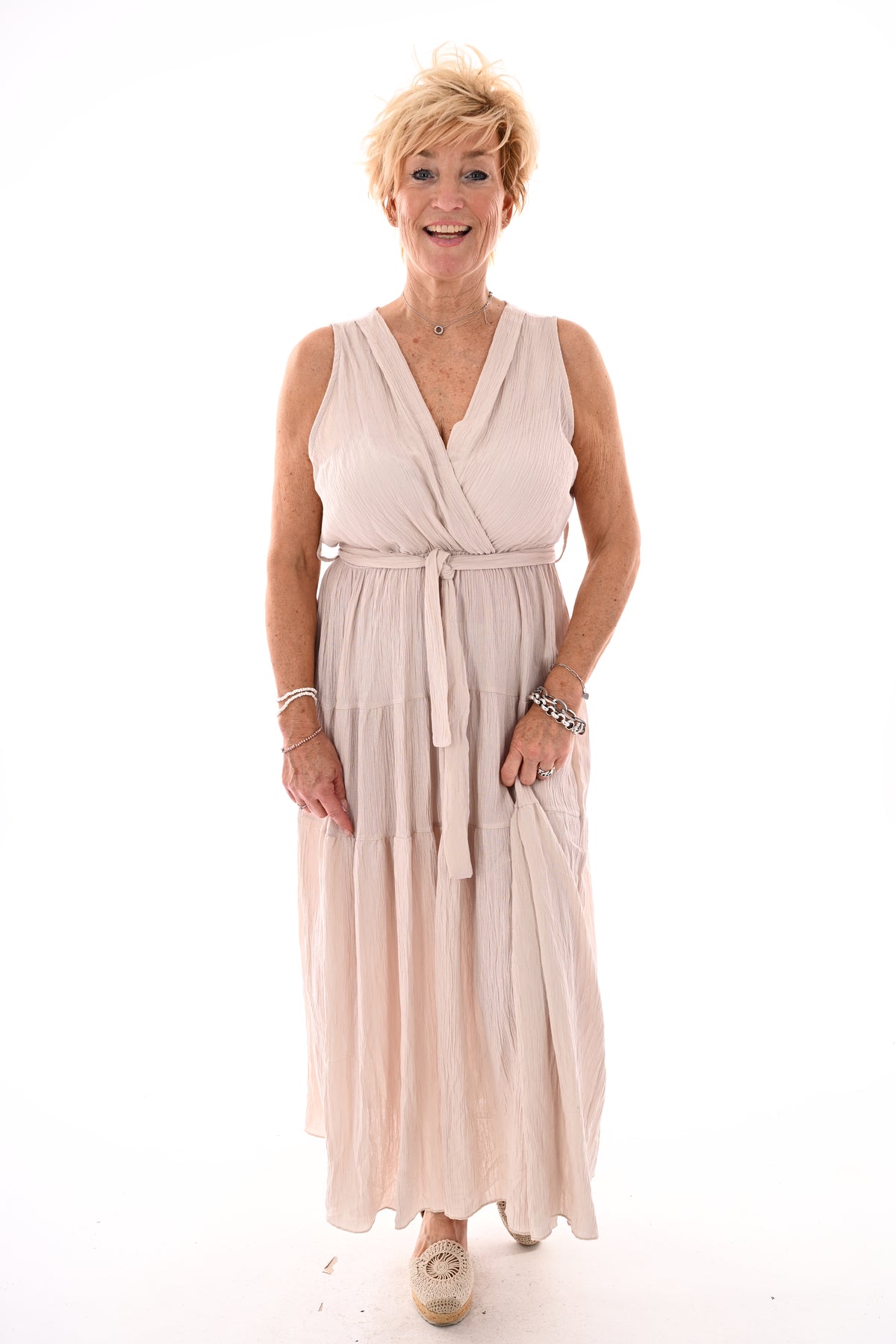 Lange jurk stroken mouwloos uni beige